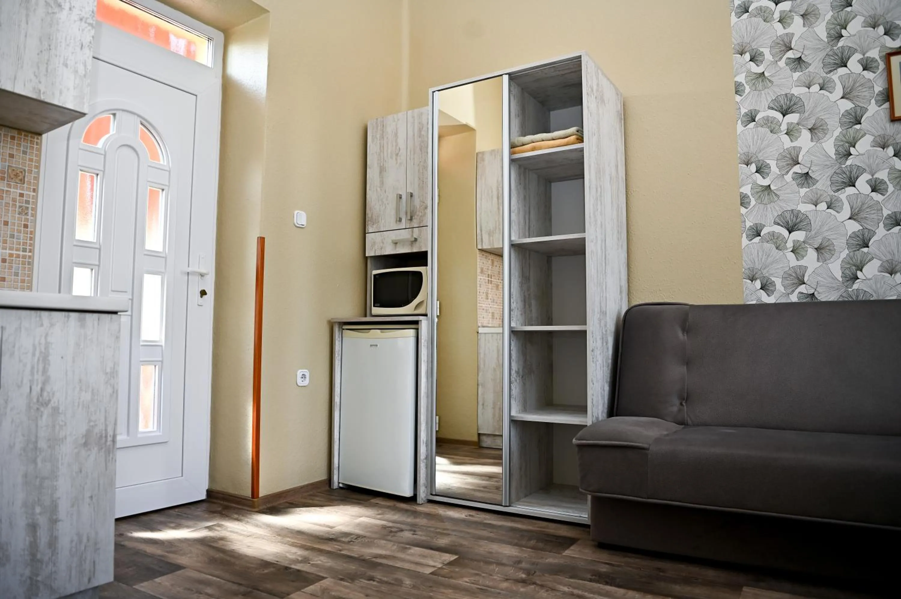 Kitchen or kitchenette in Angéla Vendegház