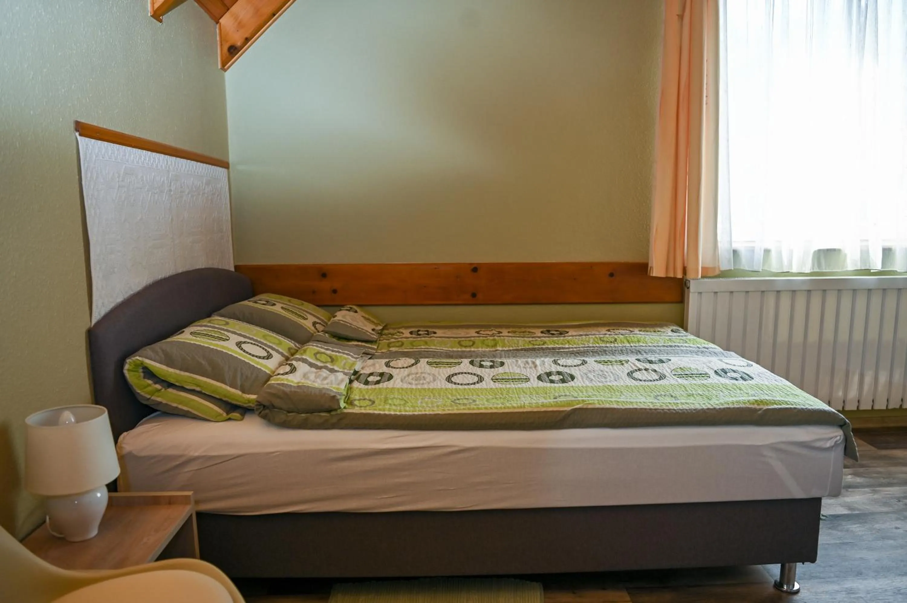 Bed in Angéla Vendegház
