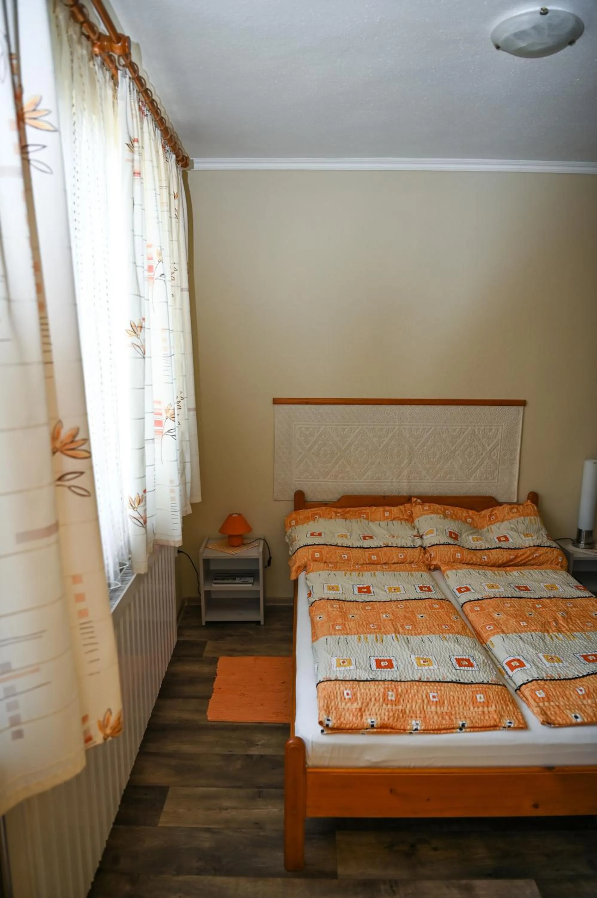 Bed in Angéla Vendegház