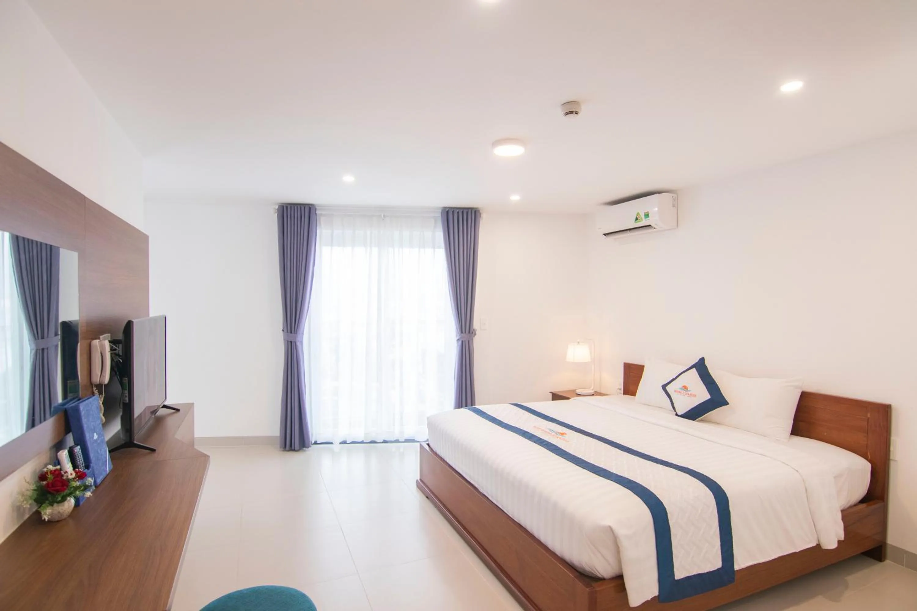 Photo of the whole room, Bed in Mermaid Seaside Hotel