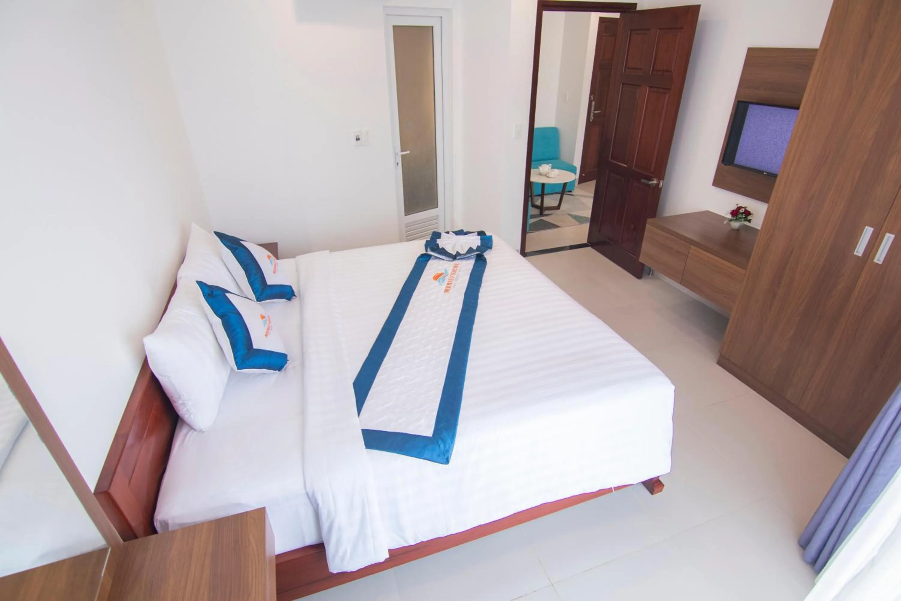 Bed in Mermaid Seaside Hotel