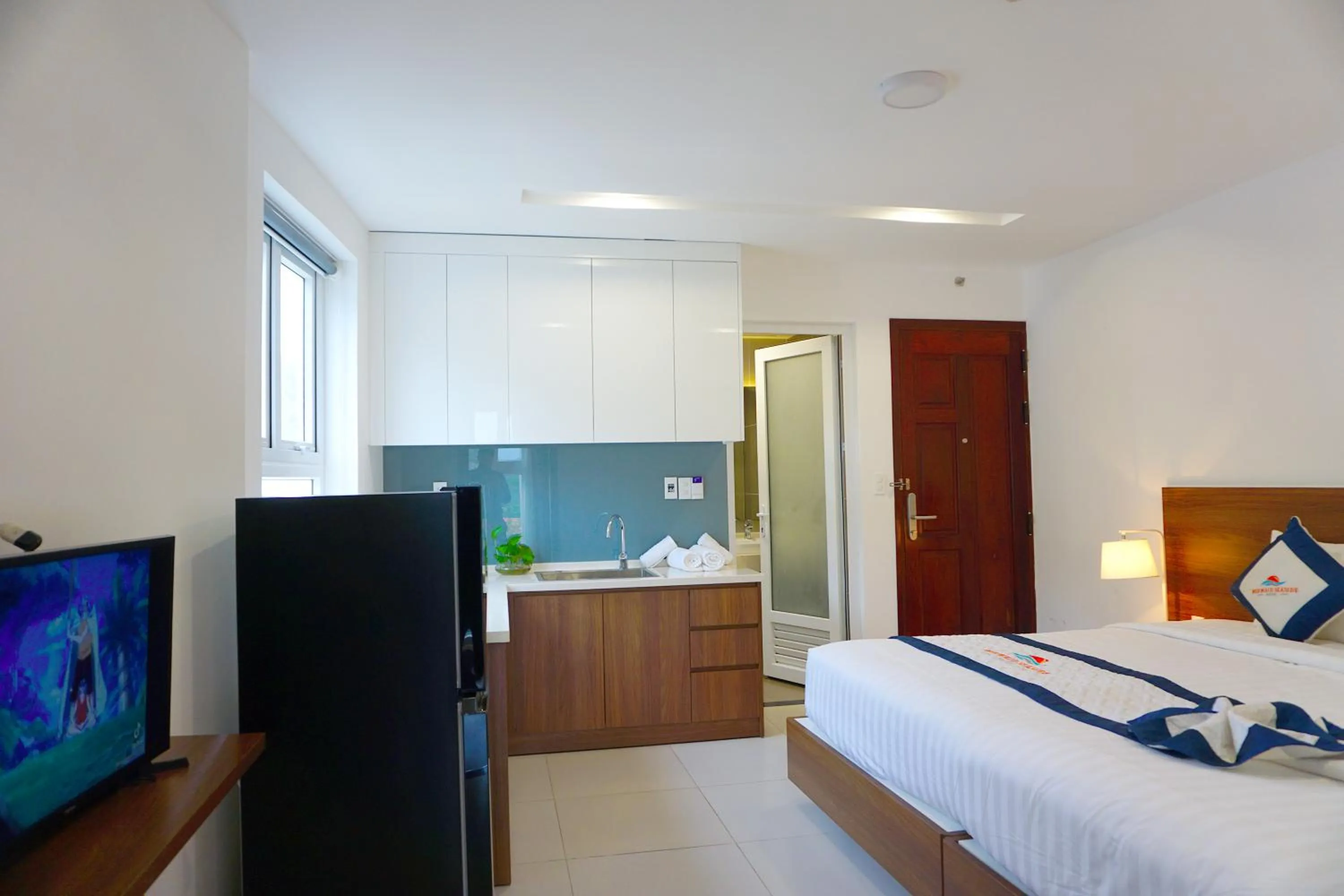 Photo of the whole room, Bed in Mermaid Seaside Hotel