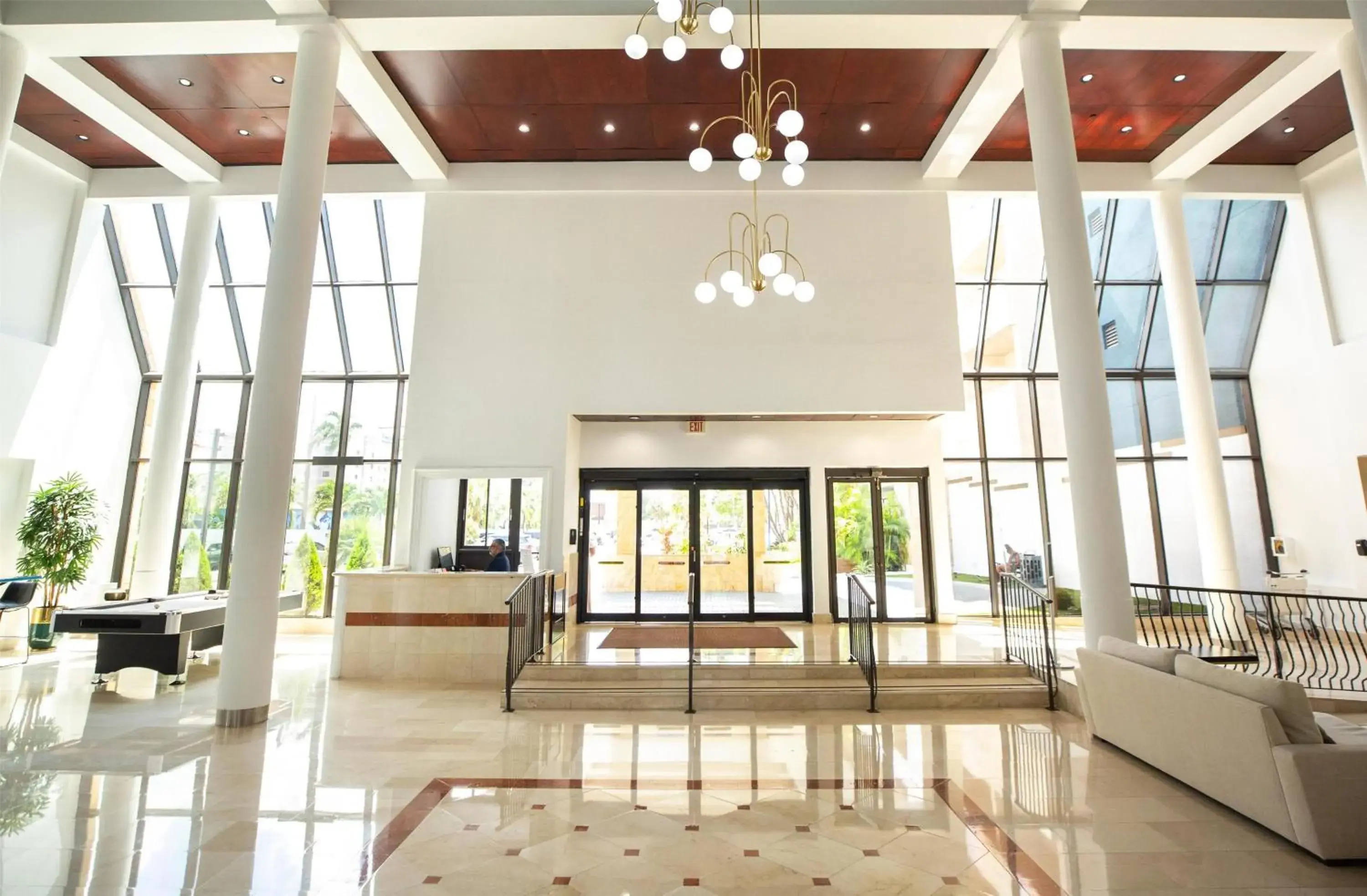 Lobby or reception in Regency Miami Airport by Sonesta Lobby or reception in Regency Miami Airport by Sonesta