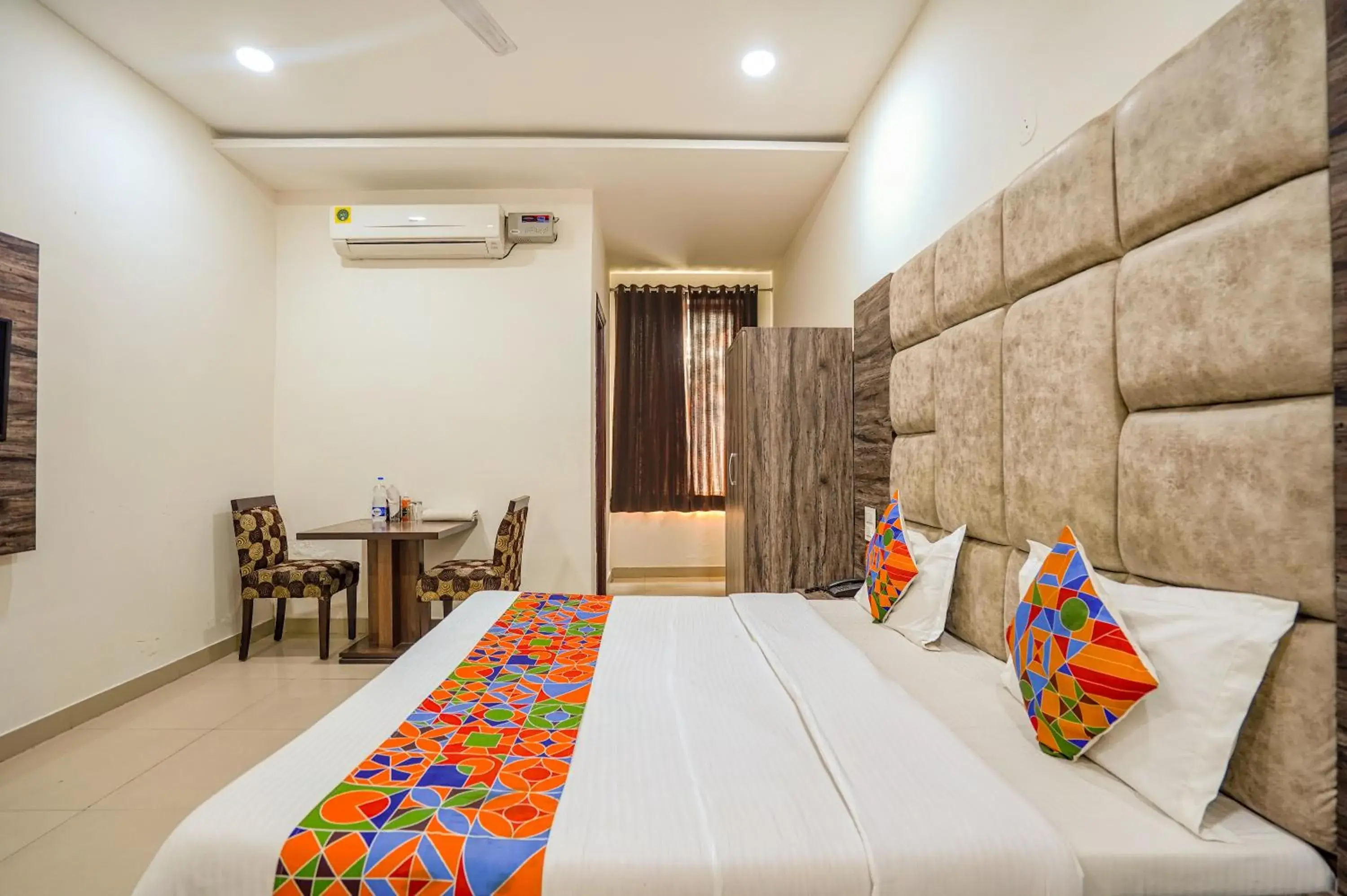 Bed in FabHotel Grand Inn Bed in FabHotel Grand Inn