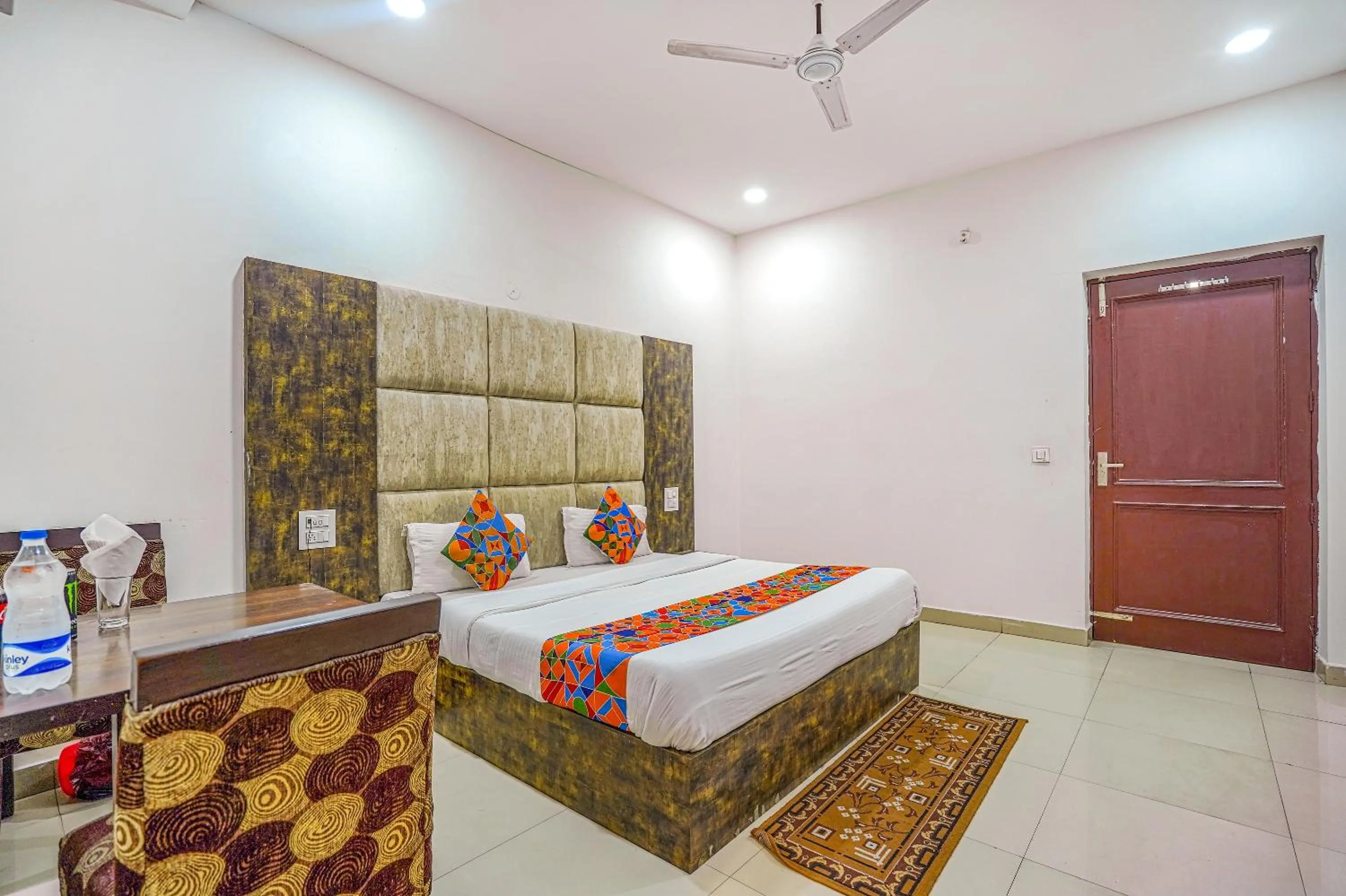 Bed in FabHotel Grand Inn