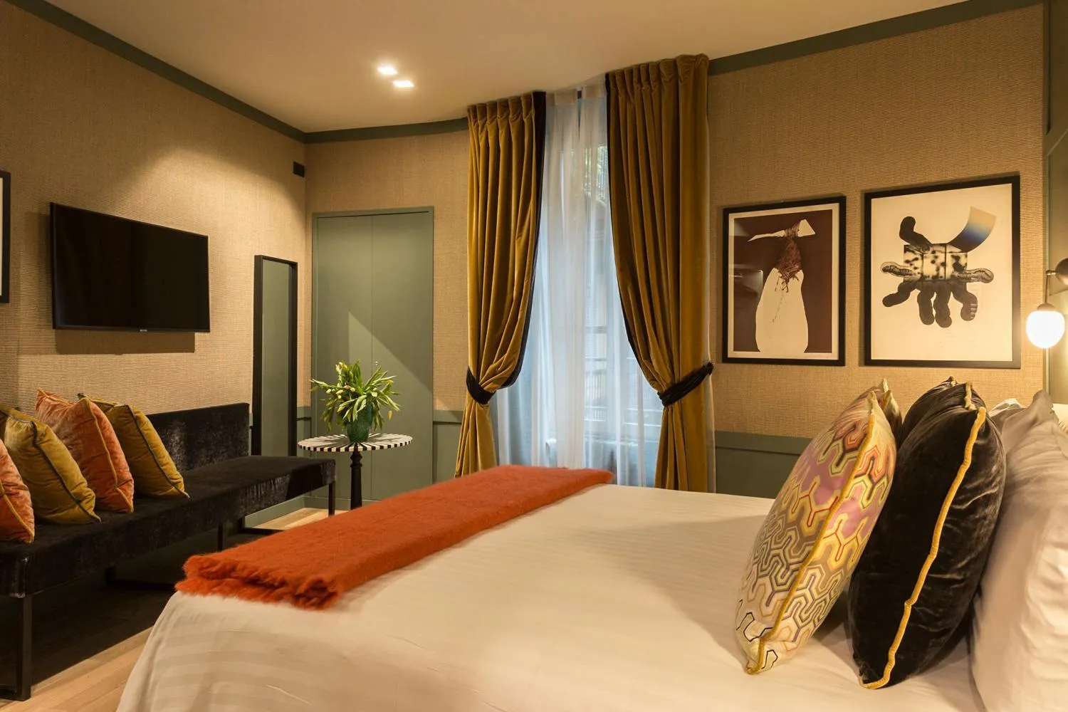 Photo of the whole room, Bed in Living Suites