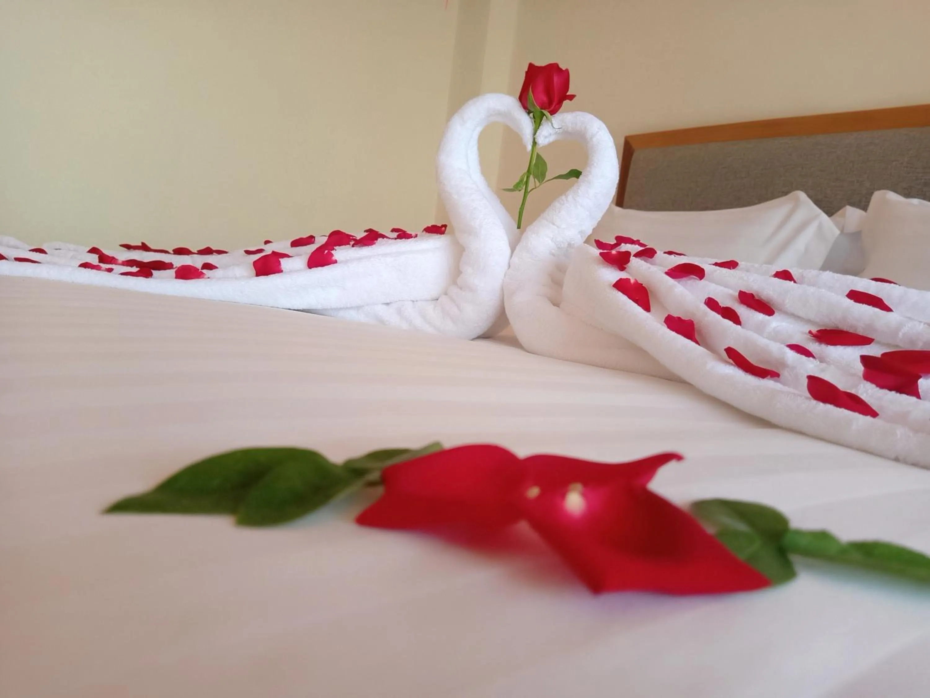 Bed in Dragon Phoenix Hotel