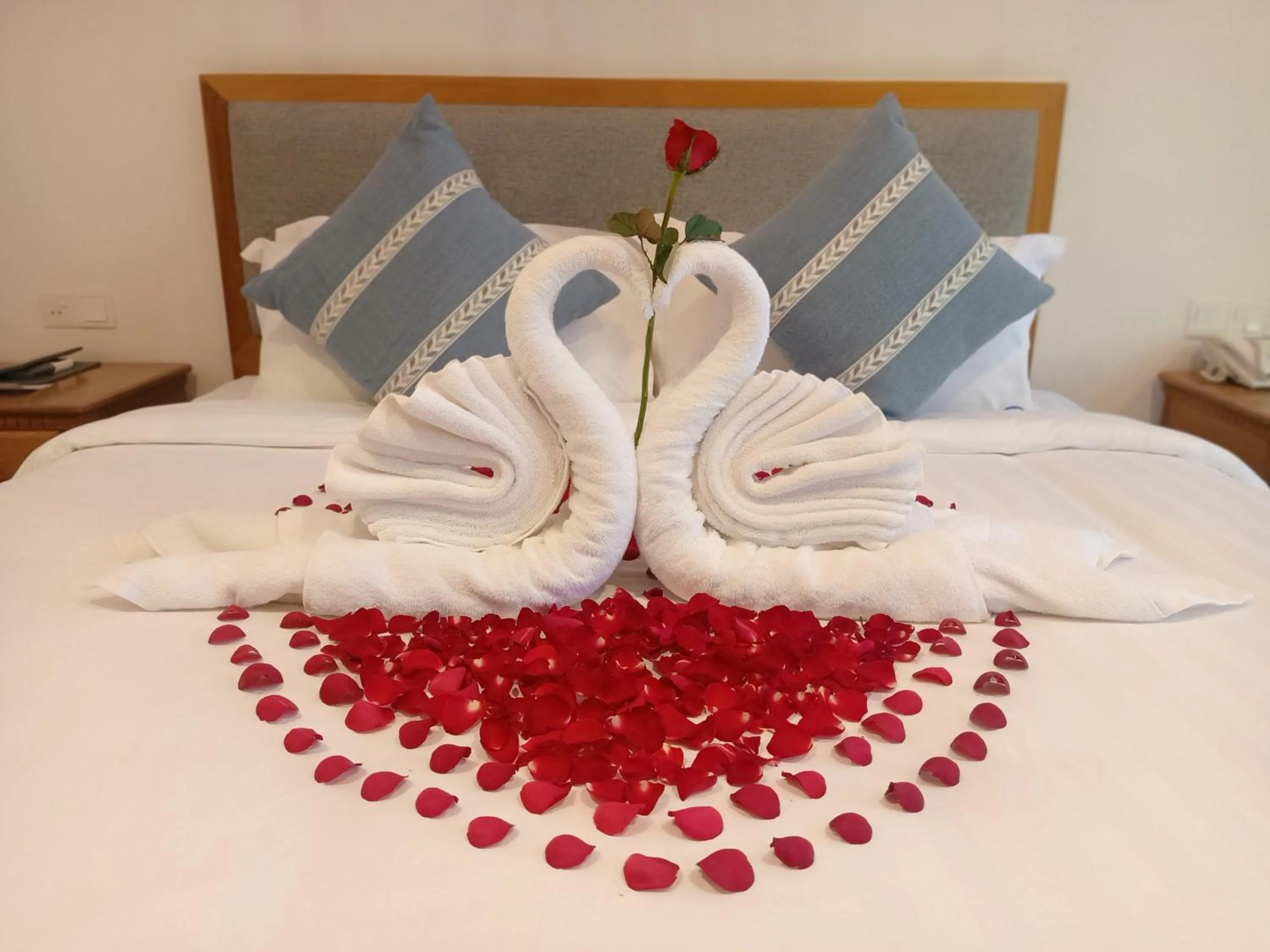 Bed in Dragon Phoenix Hotel