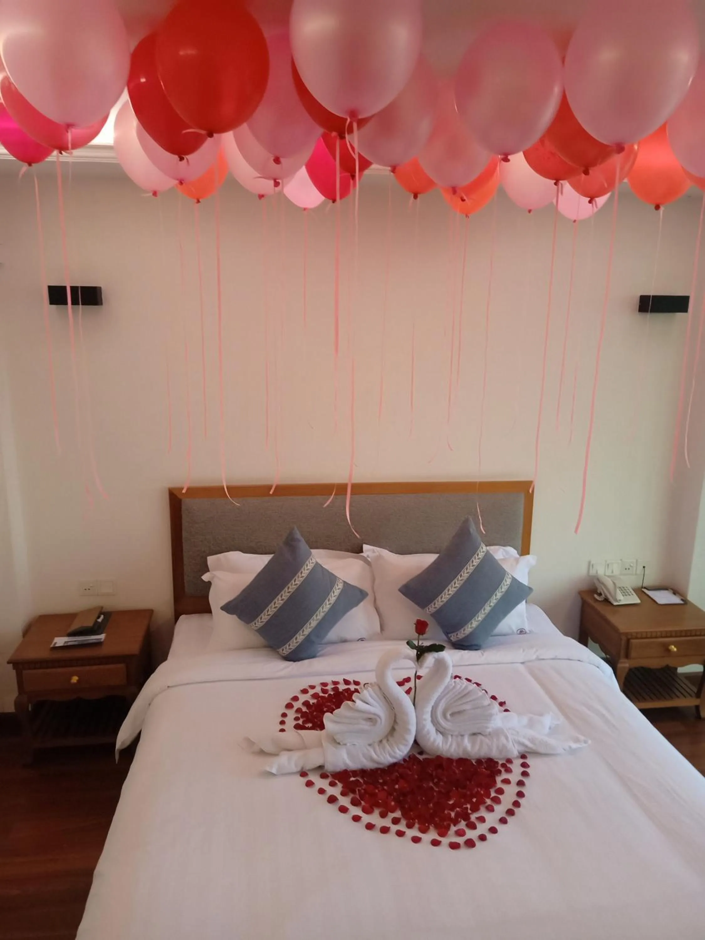 Bed in Dragon Phoenix Hotel