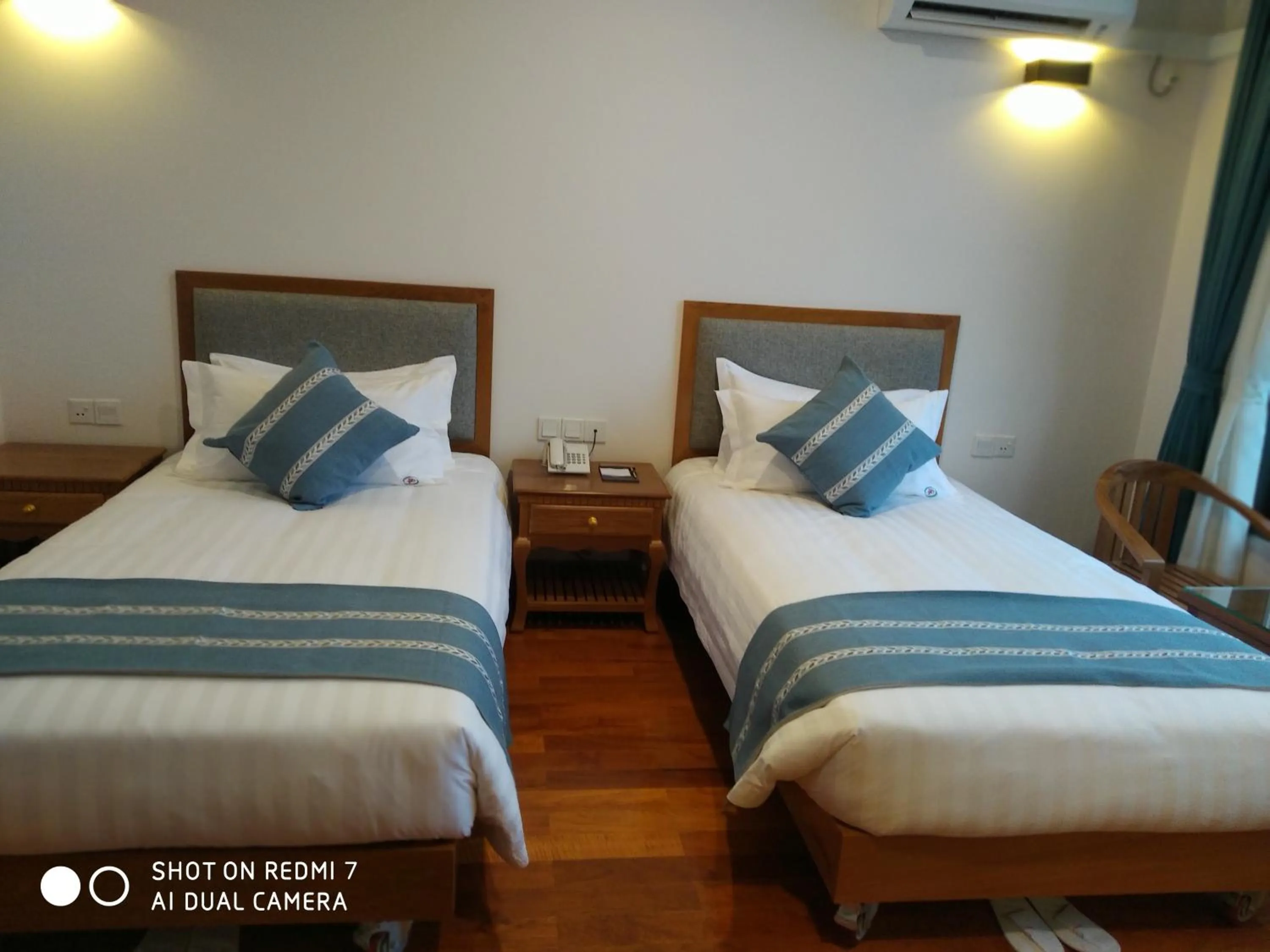 Photo of the whole room, Bed in Dragon Phoenix Hotel