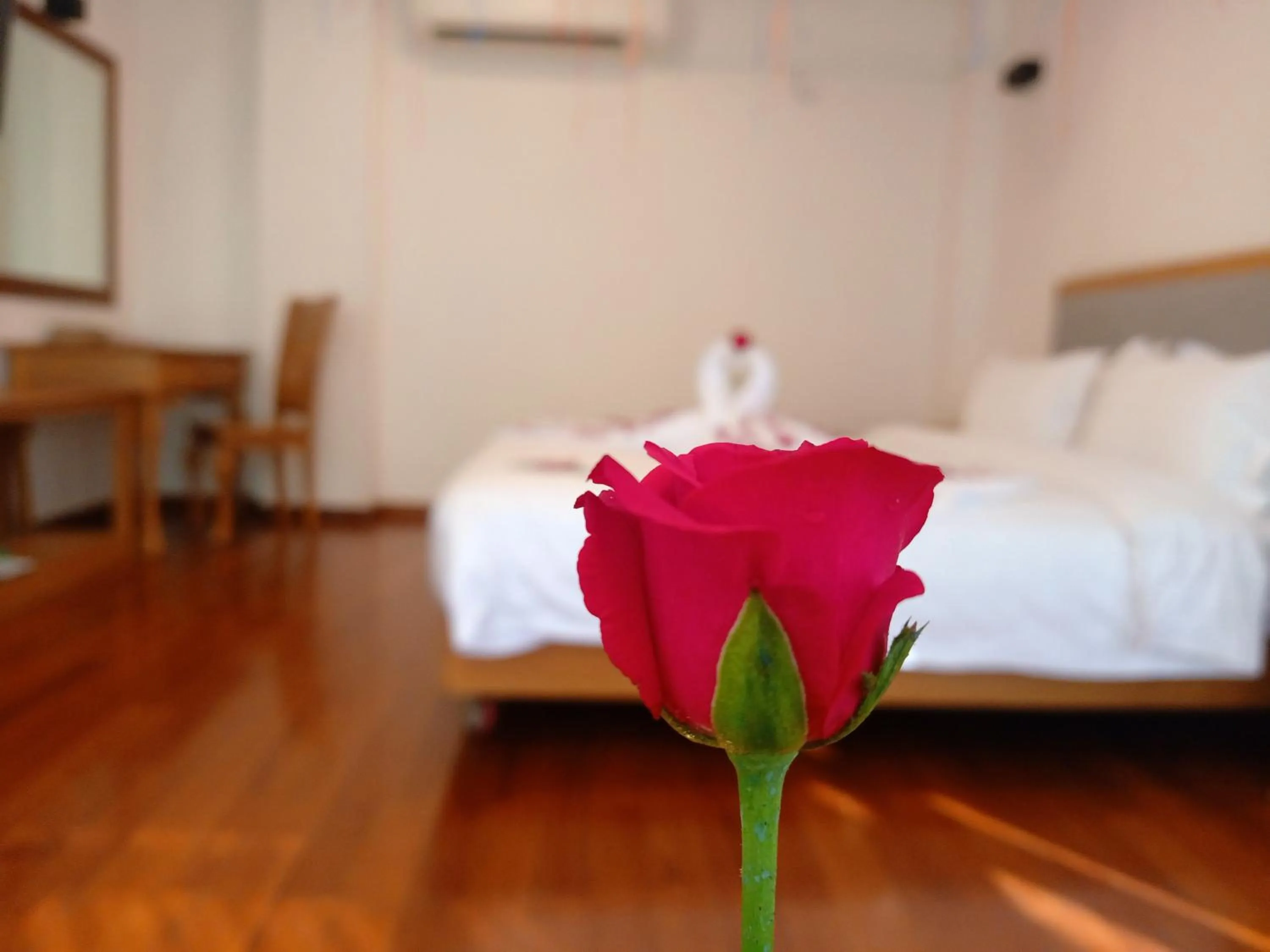 Bed in Dragon Phoenix Hotel