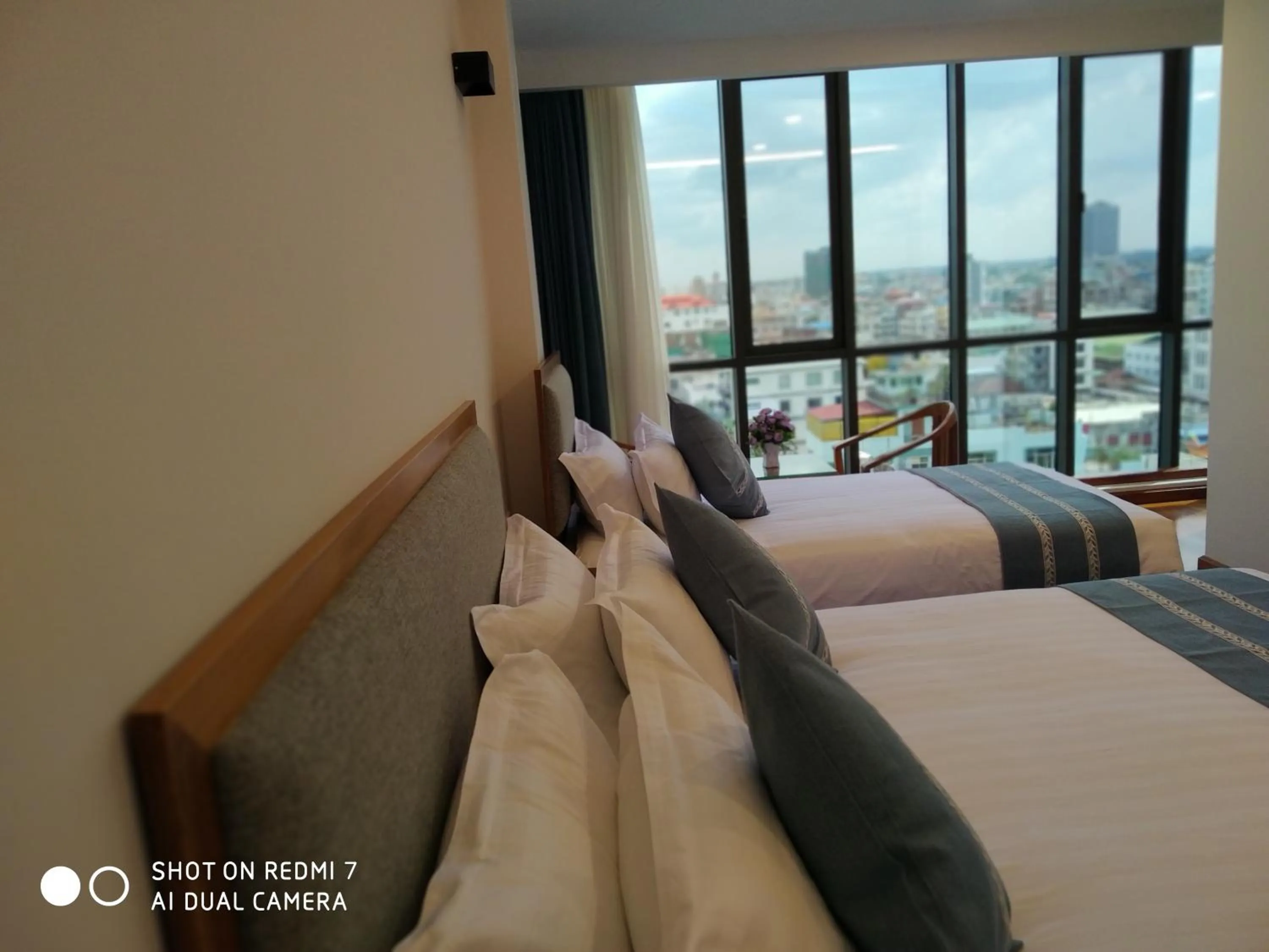 Photo of the whole room, Bed in Dragon Phoenix Hotel