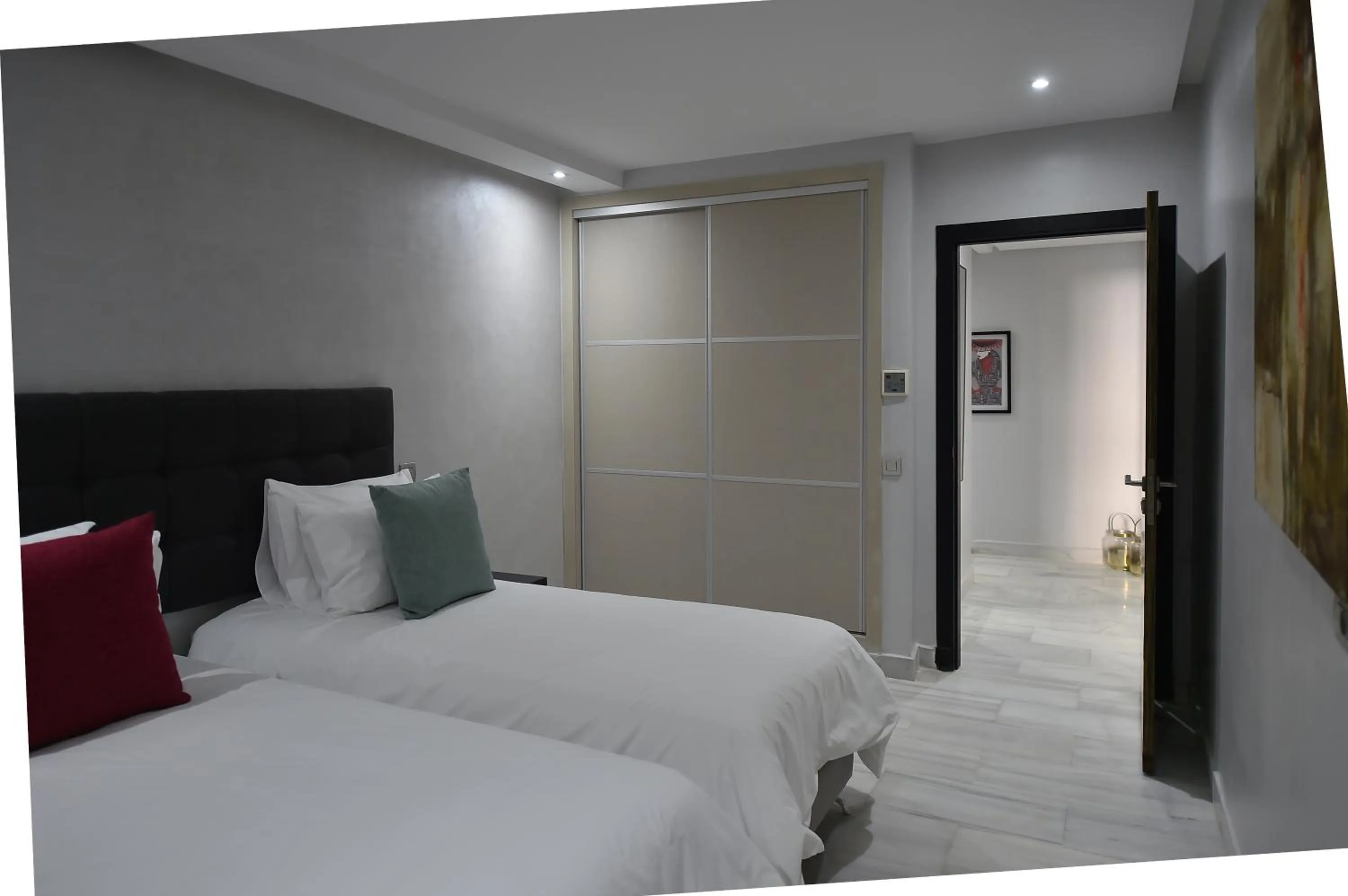 Bed in Le Yacht Suites Hotel