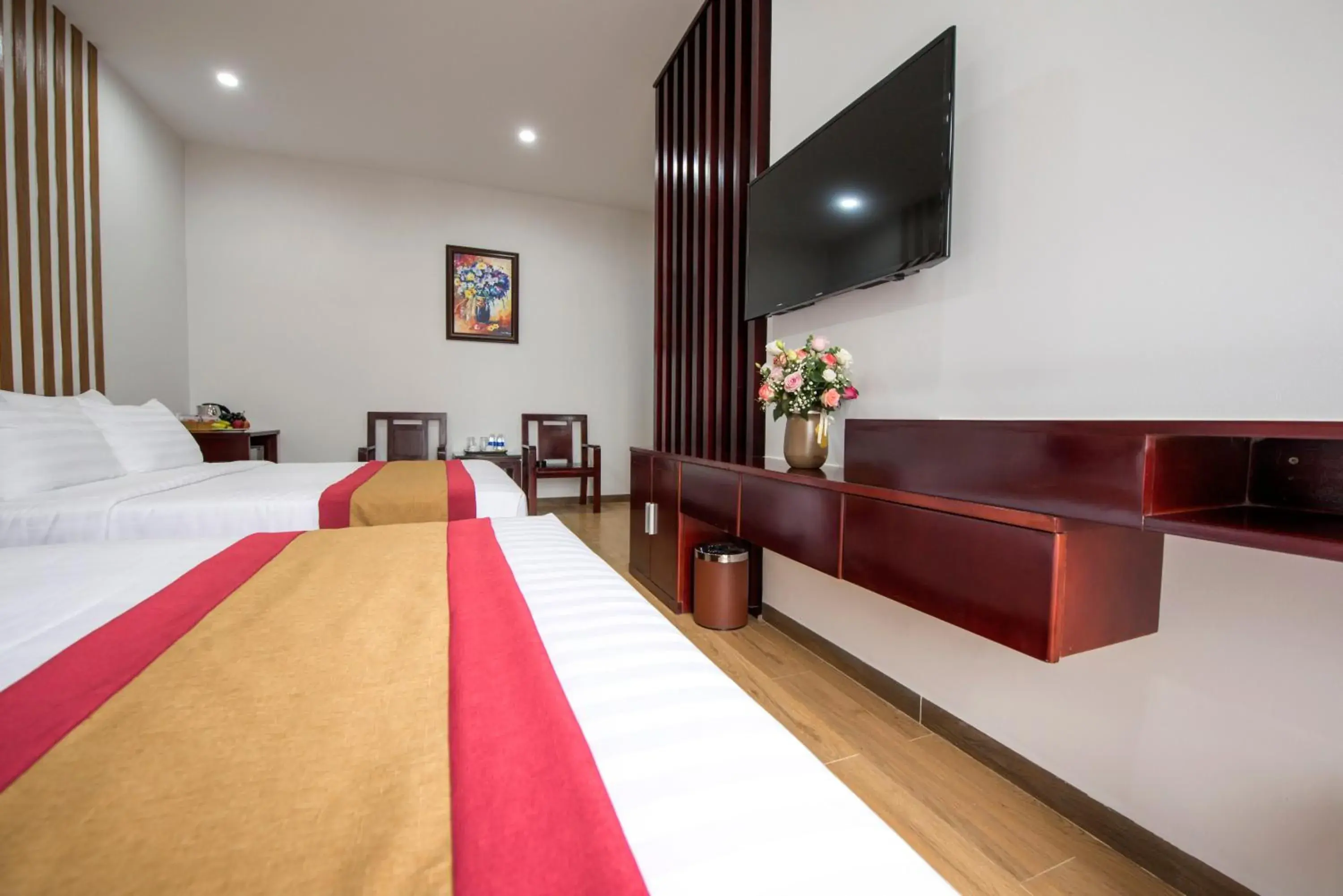 Communal lounge/ TV room, Bed in Dac Tin Luxury Hotel Communal lounge/ TV room, Bed in Dac Tin Luxury Hotel