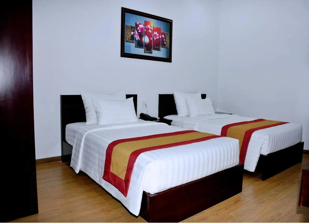 Bed in Dac Tin Luxury Hotel