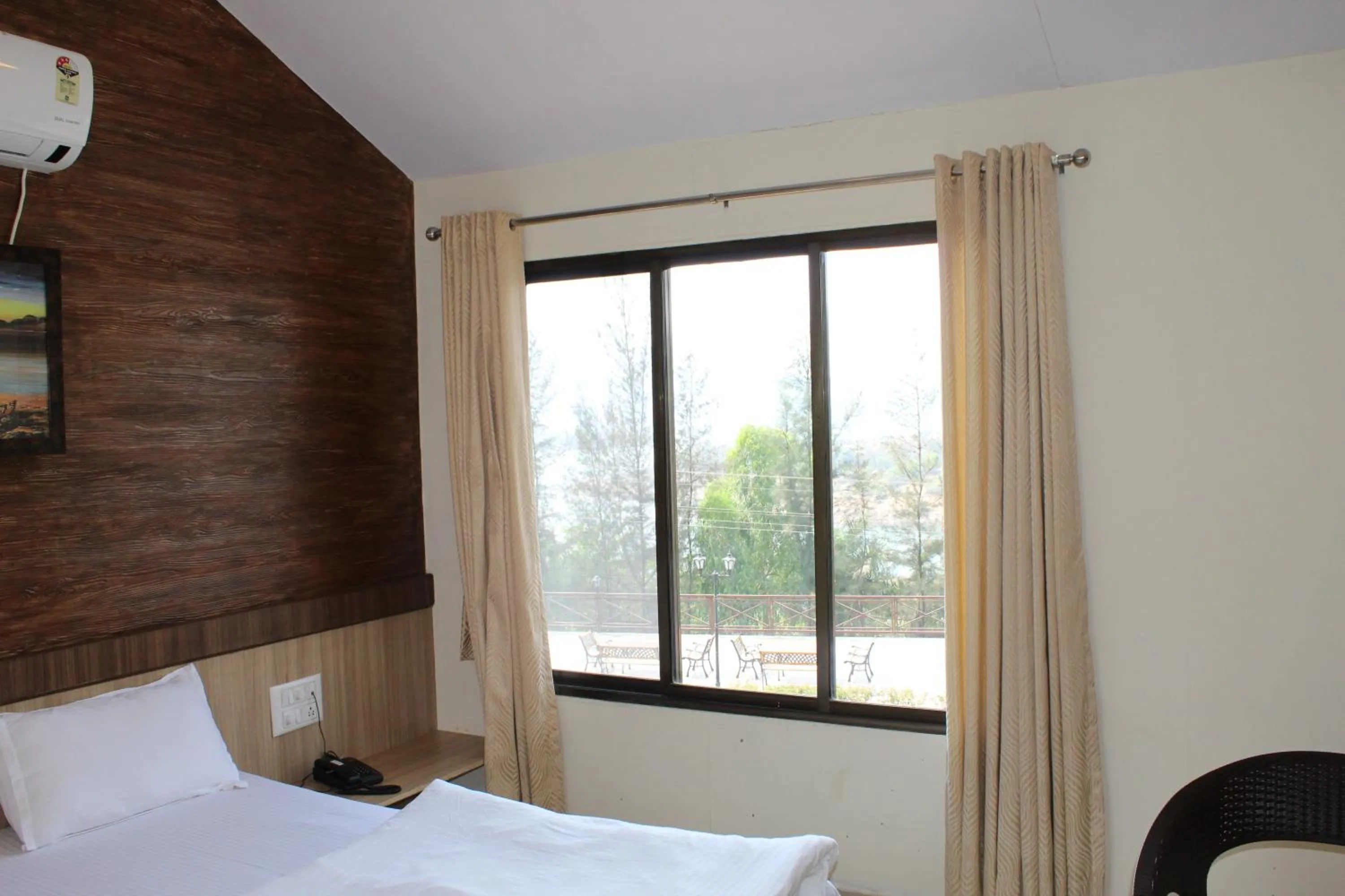 Garden view, Bed in Green Velvet Resort-Near Pawna Lake