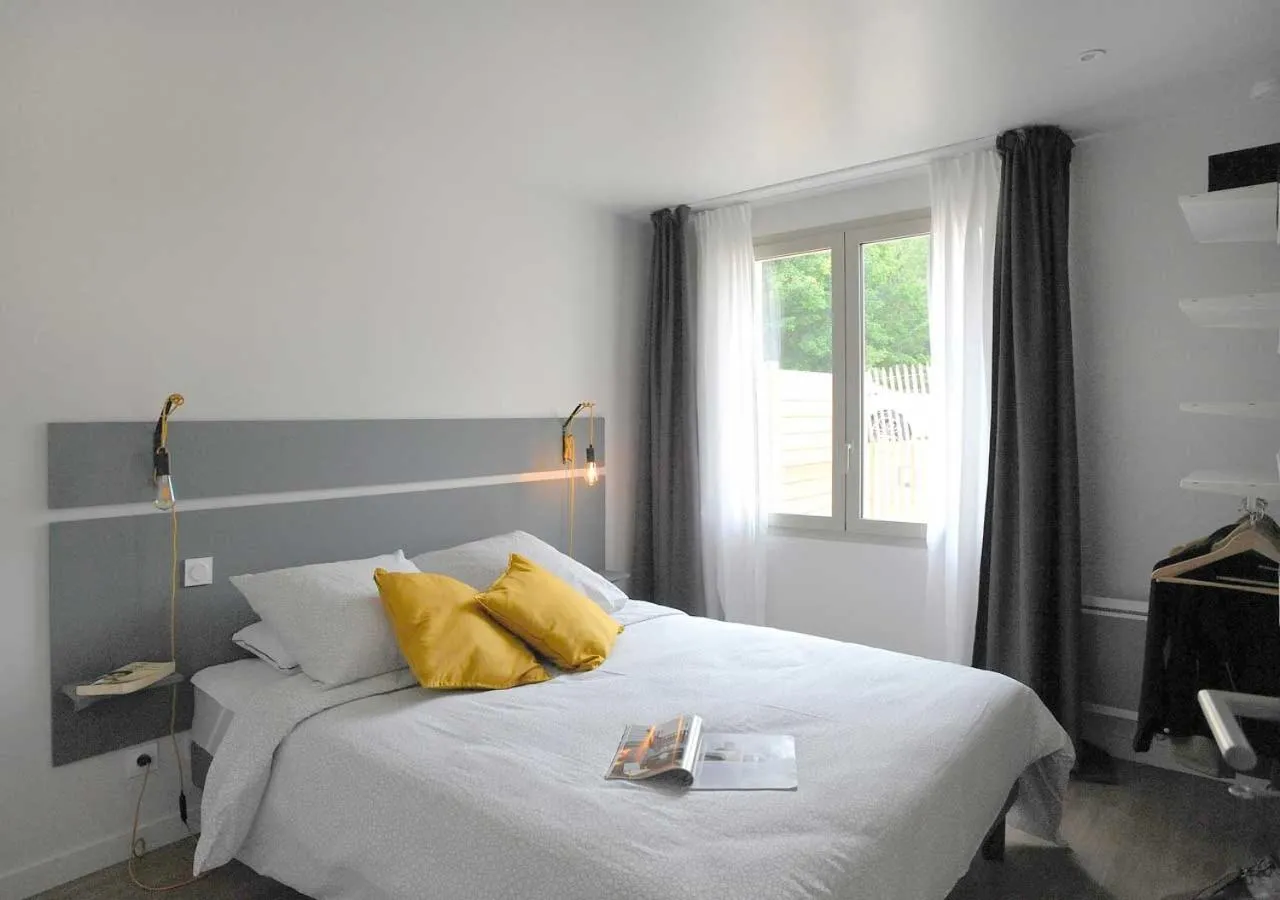 Photo of the whole room, Bed in CLOS DES THERMES A JONZAC