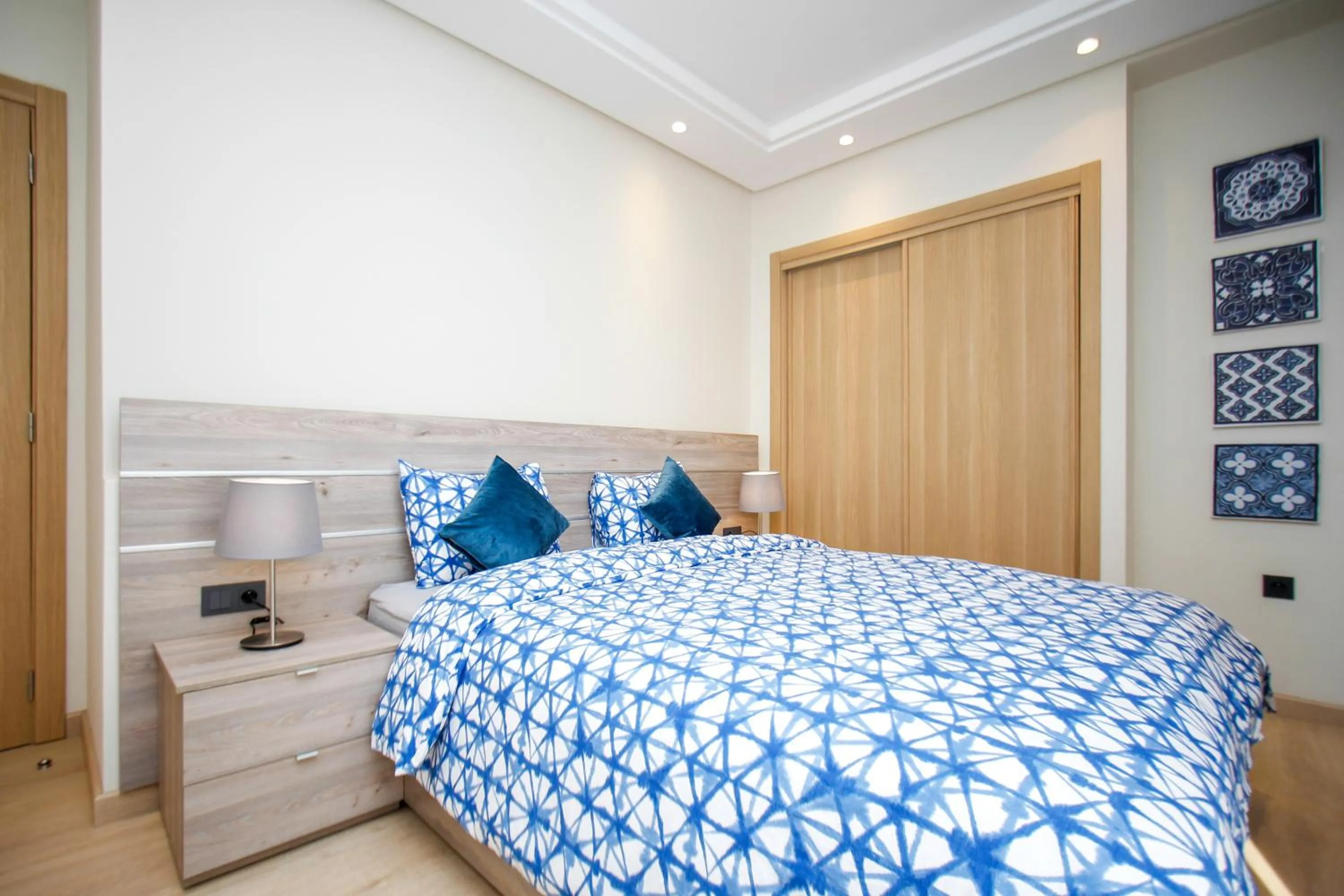 Bed in Flamant Rose Appart Hotel