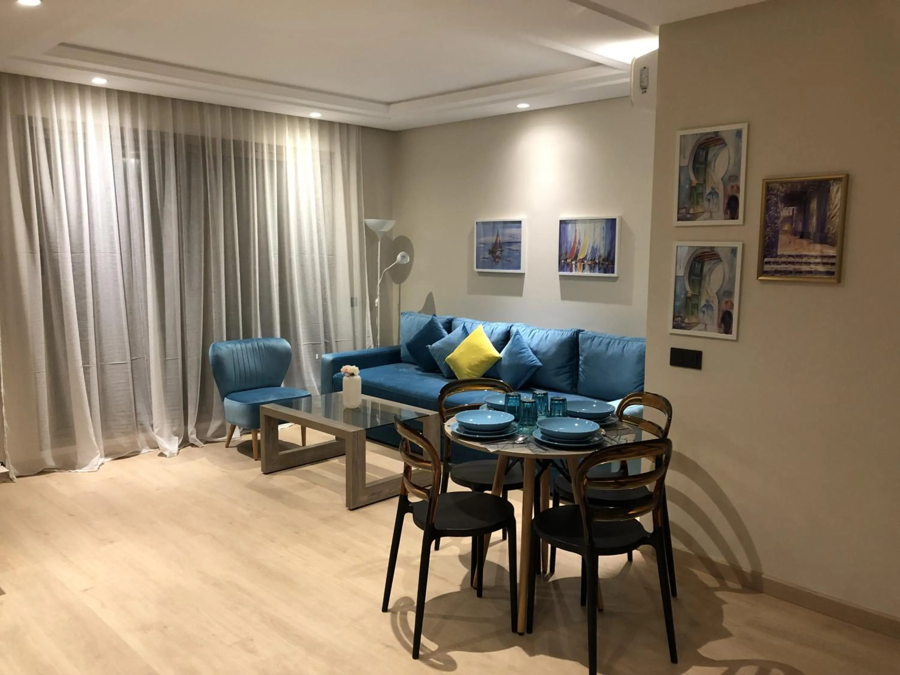 Living room in Flamant Rose Appart Hotel