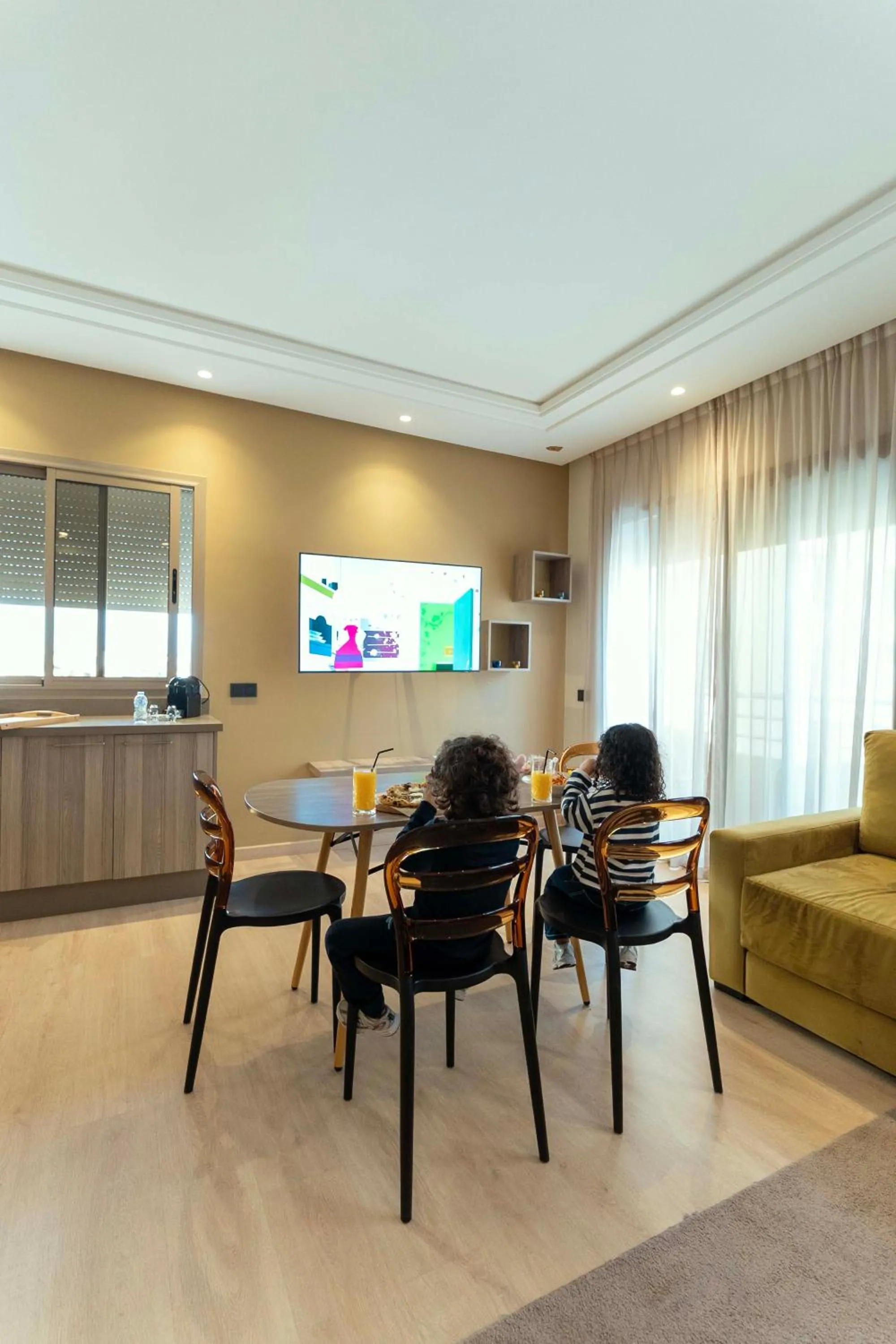 Living room in Flamant Rose Appart Hotel