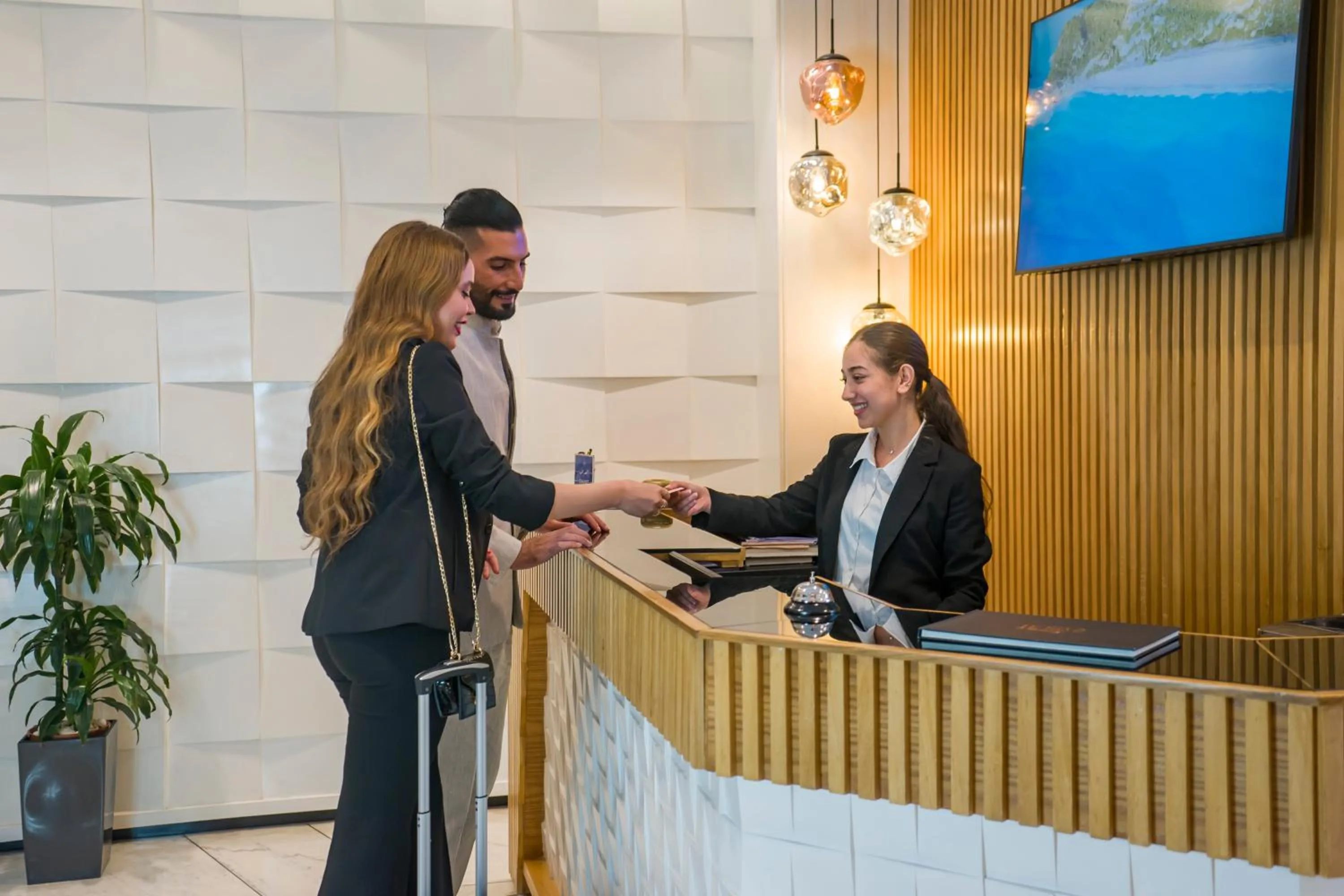 Lobby or reception in Flamant Rose Appart Hotel