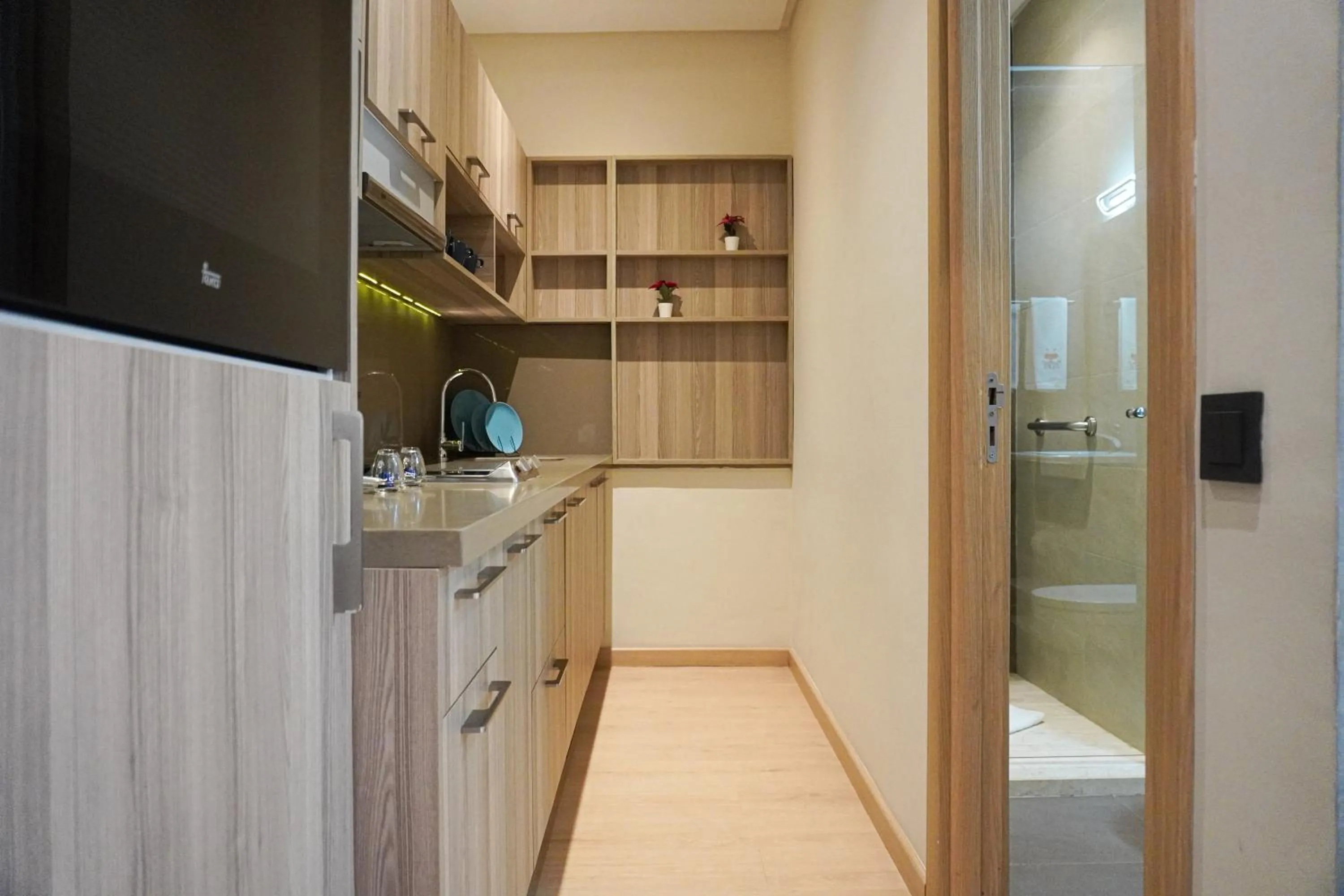 kitchen in Flamant Rose Appart Hotel