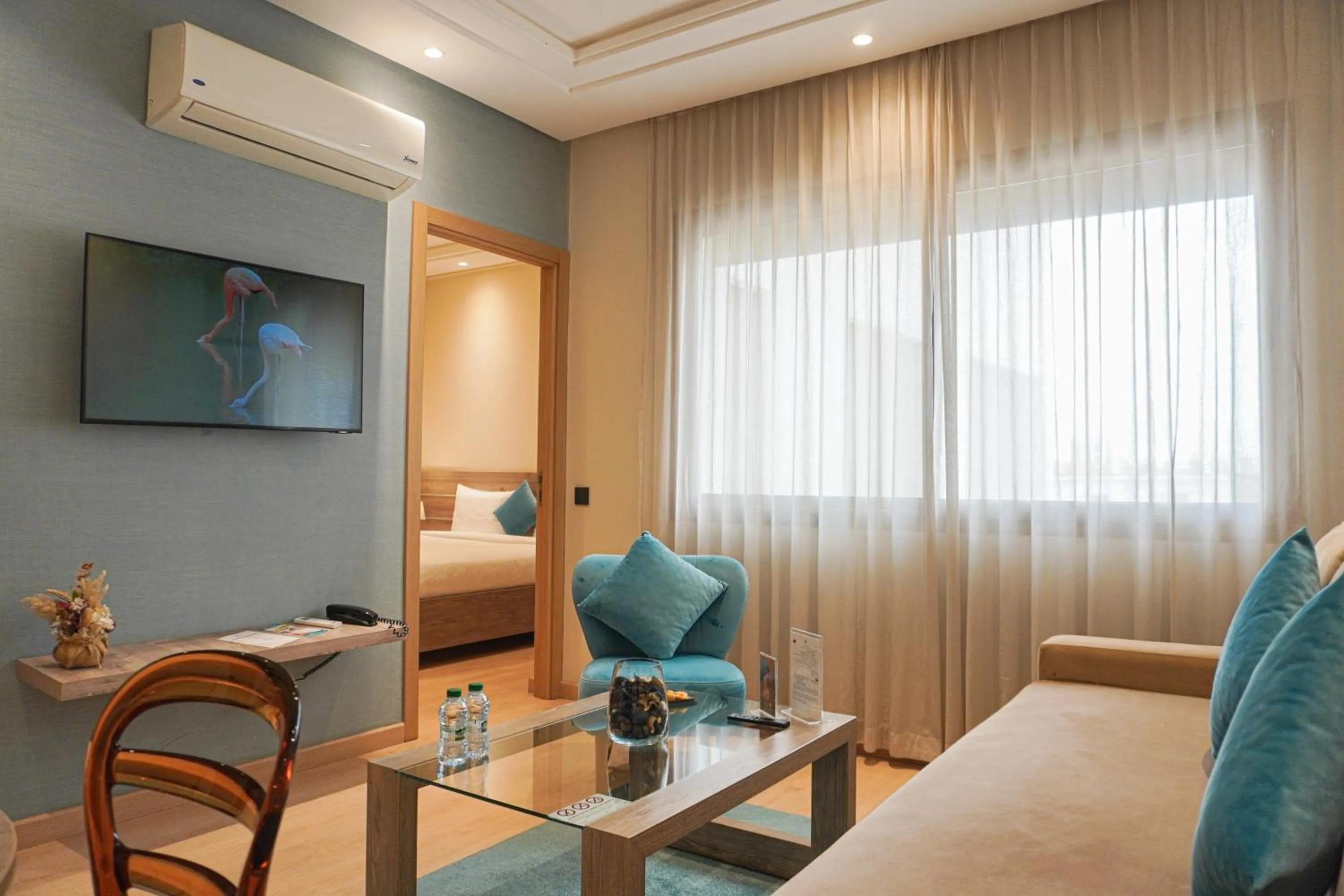 Living room in Flamant Rose Appart Hotel