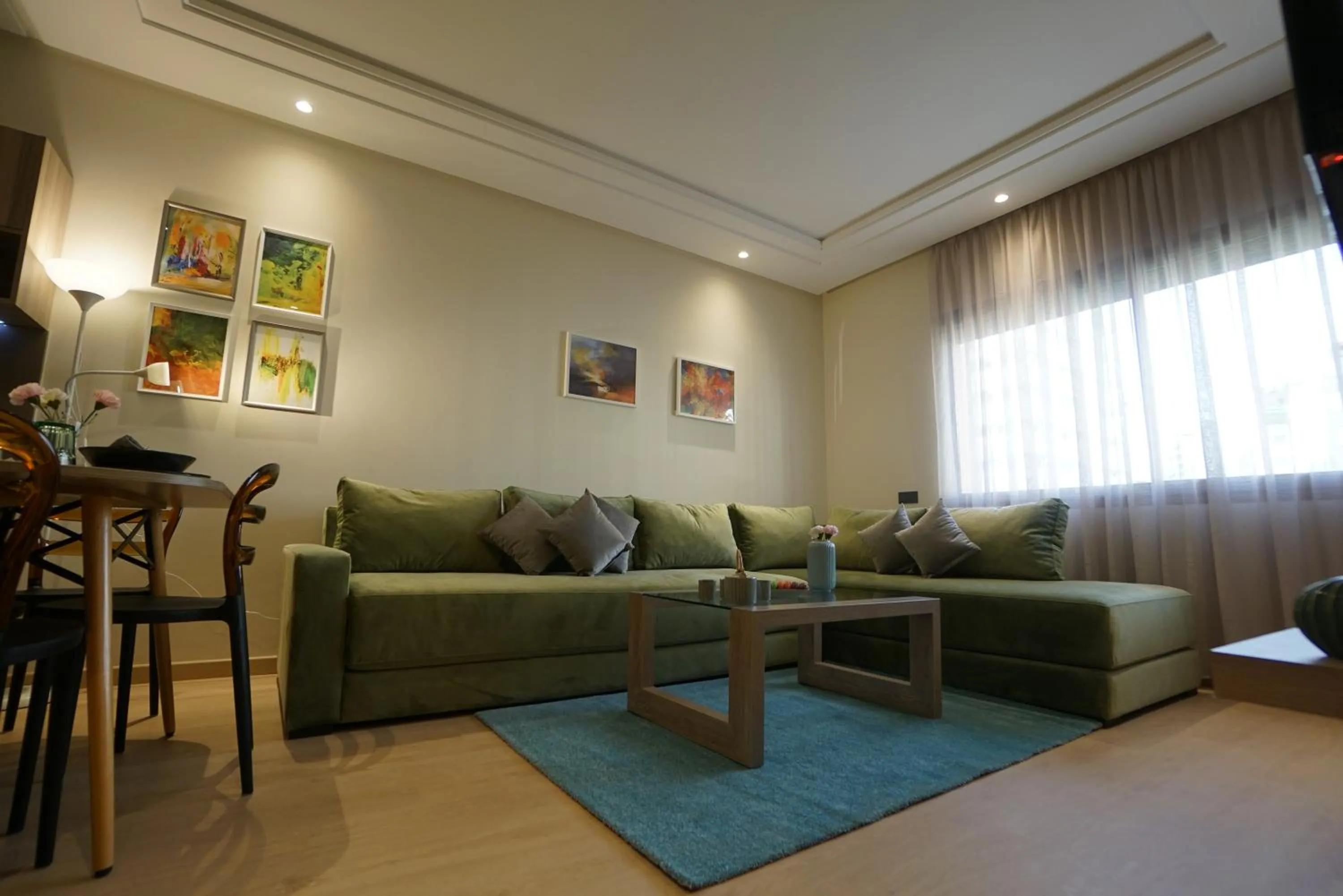 Living room in Flamant Rose Appart Hotel