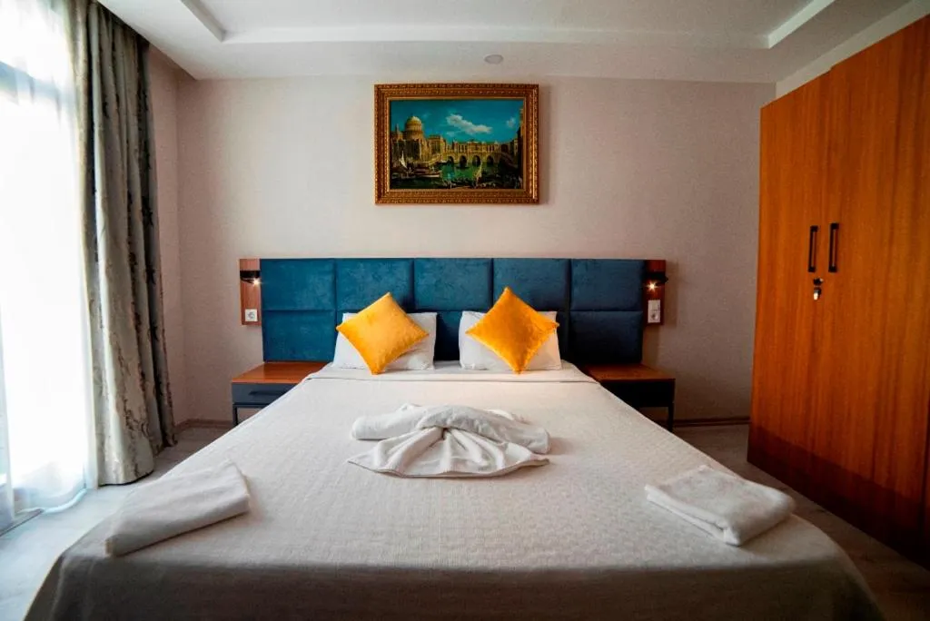 Bed in Sirena Apart & SPA