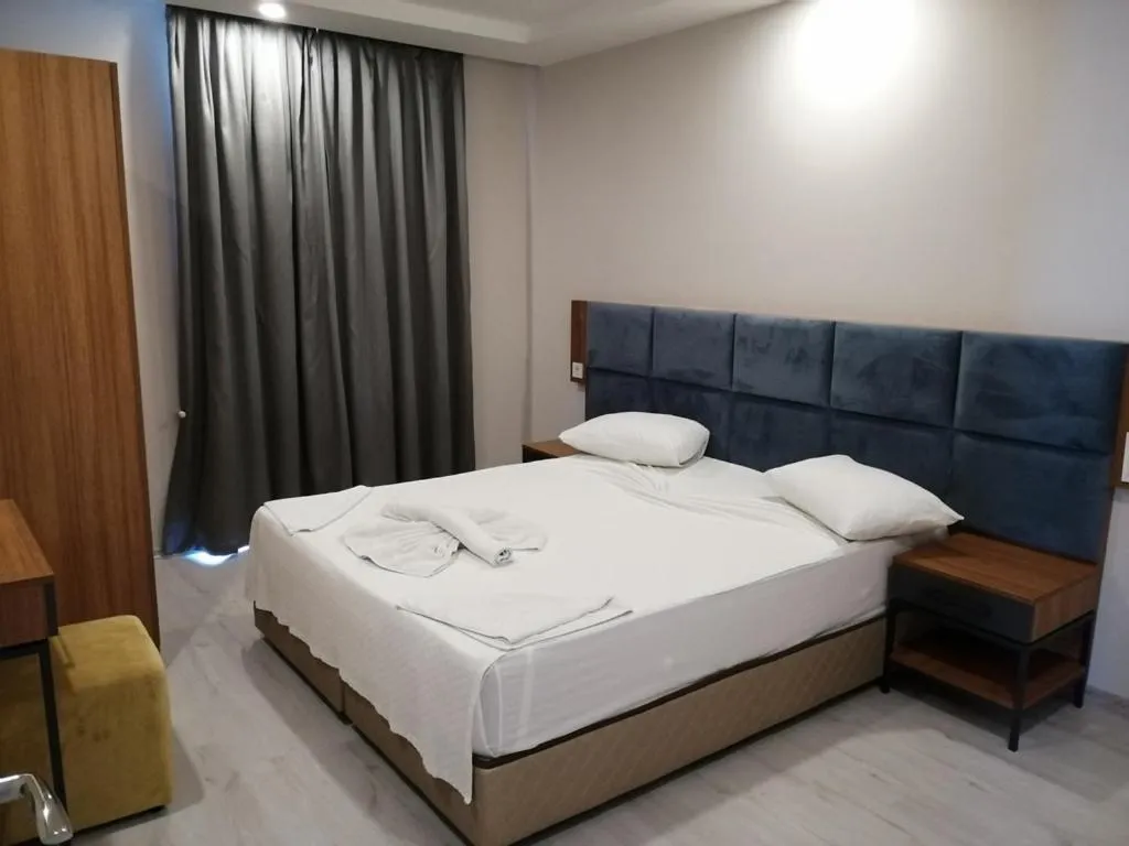 Bed in Sirena Apart & SPA