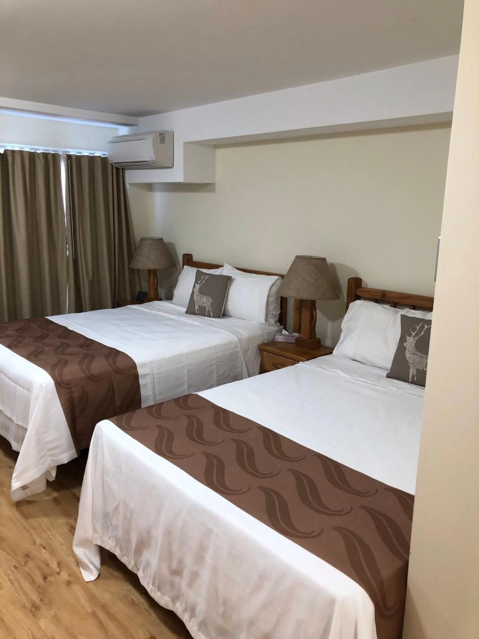 Bed in Muskoka Lakes Hotel and Resorts