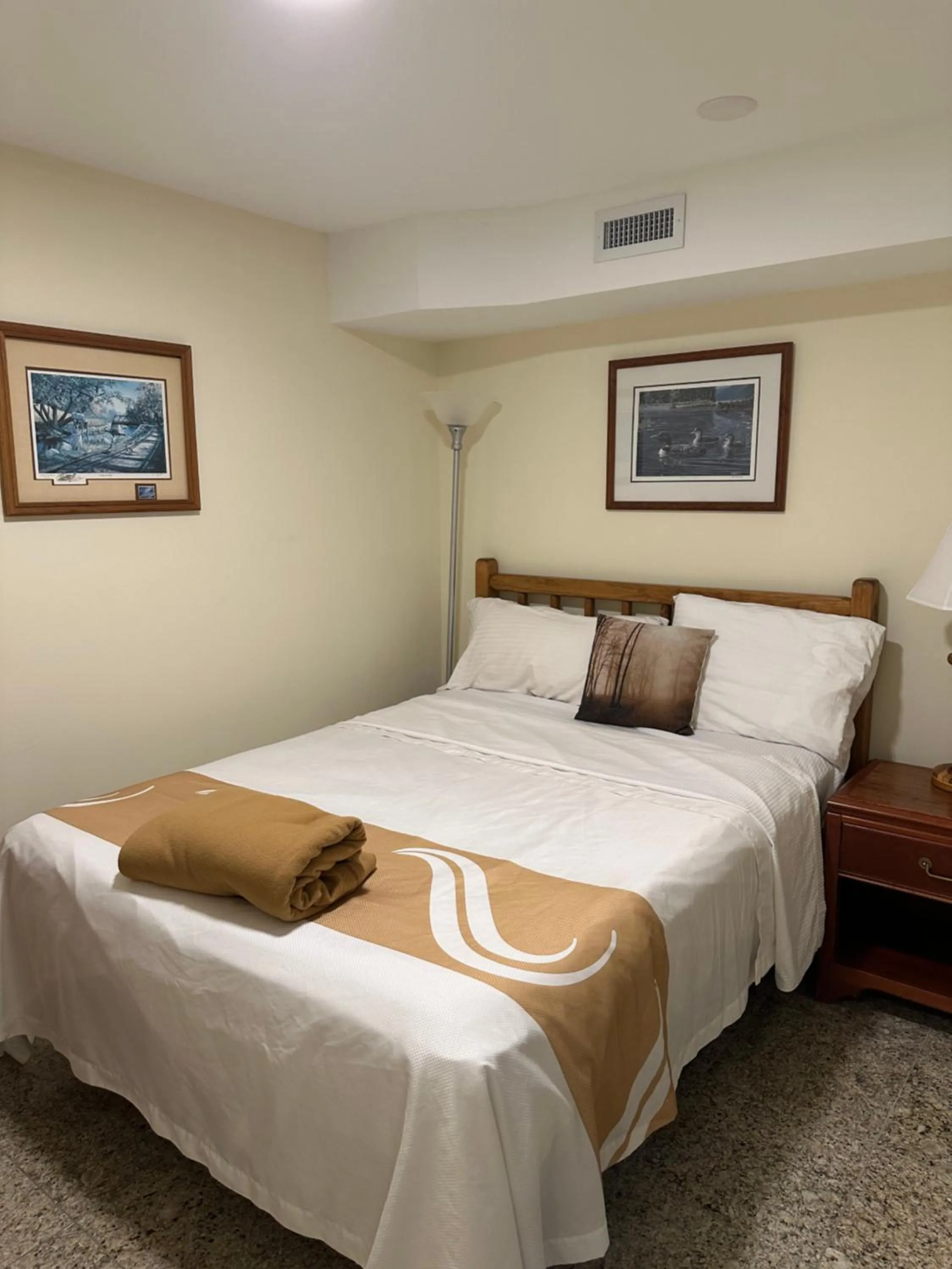 Bed in Muskoka Lakes Hotel and Resorts