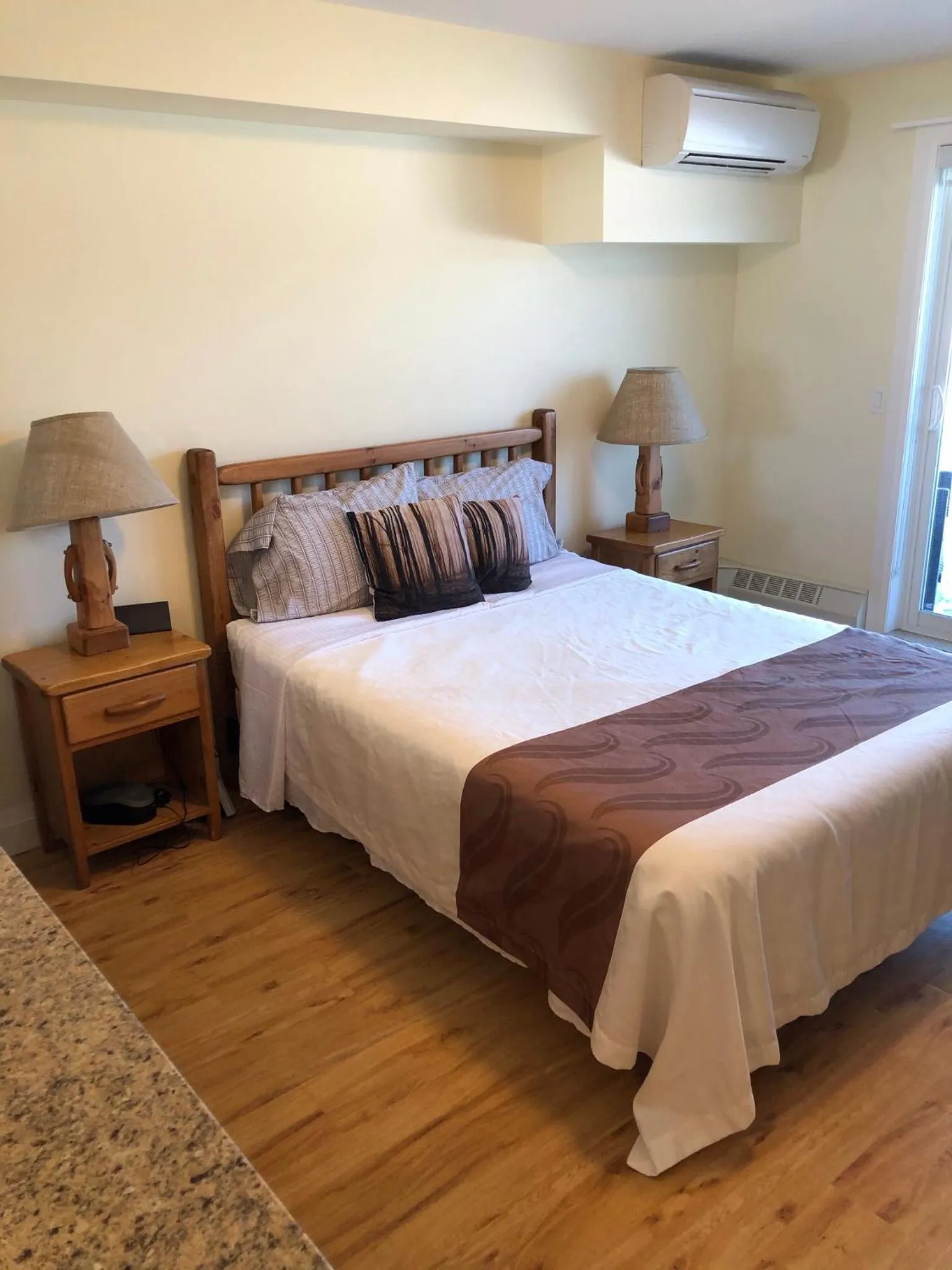 Bed in Muskoka Lakes Hotel and Resorts