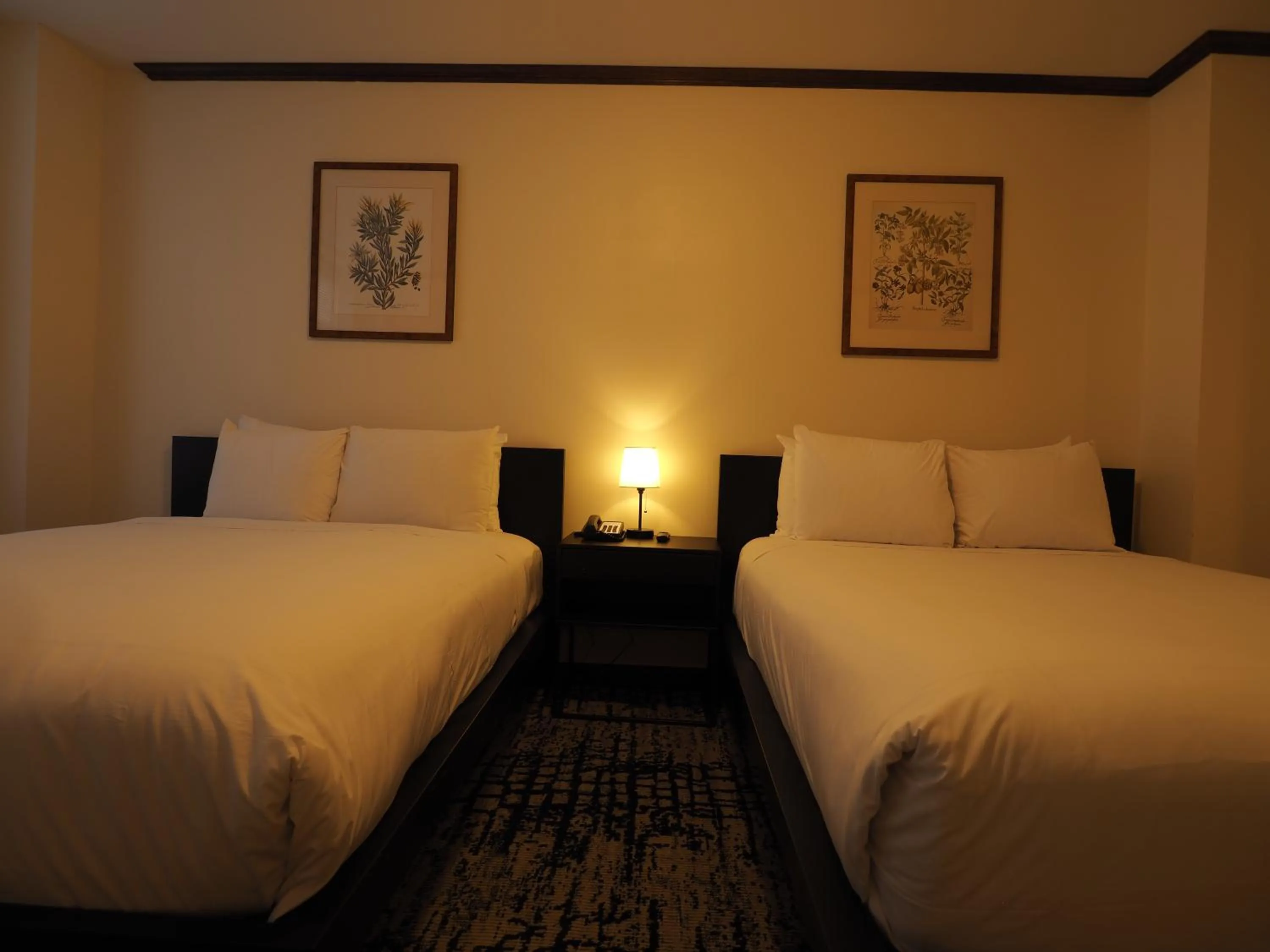 Bed in Night Hotel Broadway