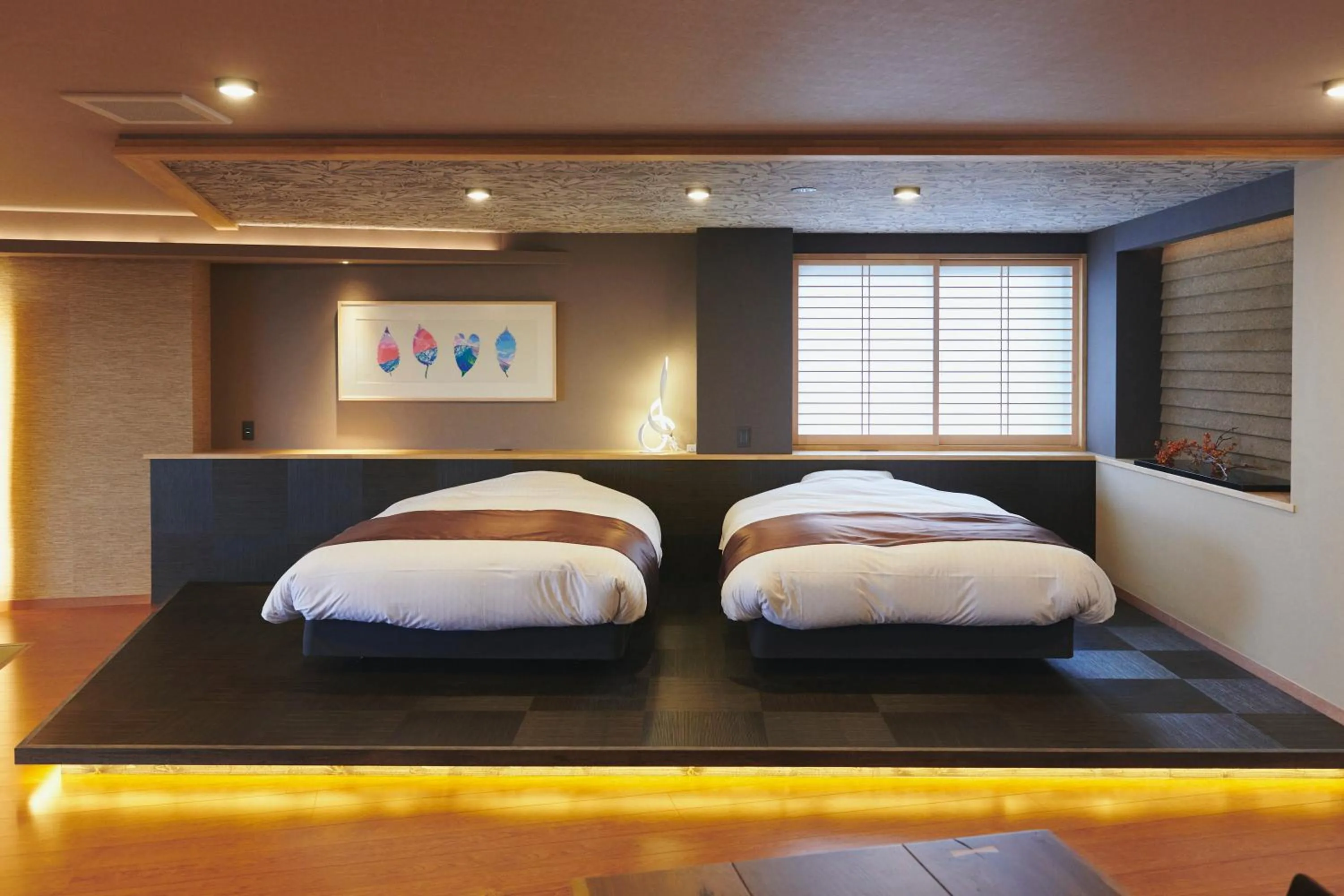 Bed in ITADAKI Daisen 大山参道ホテル頂