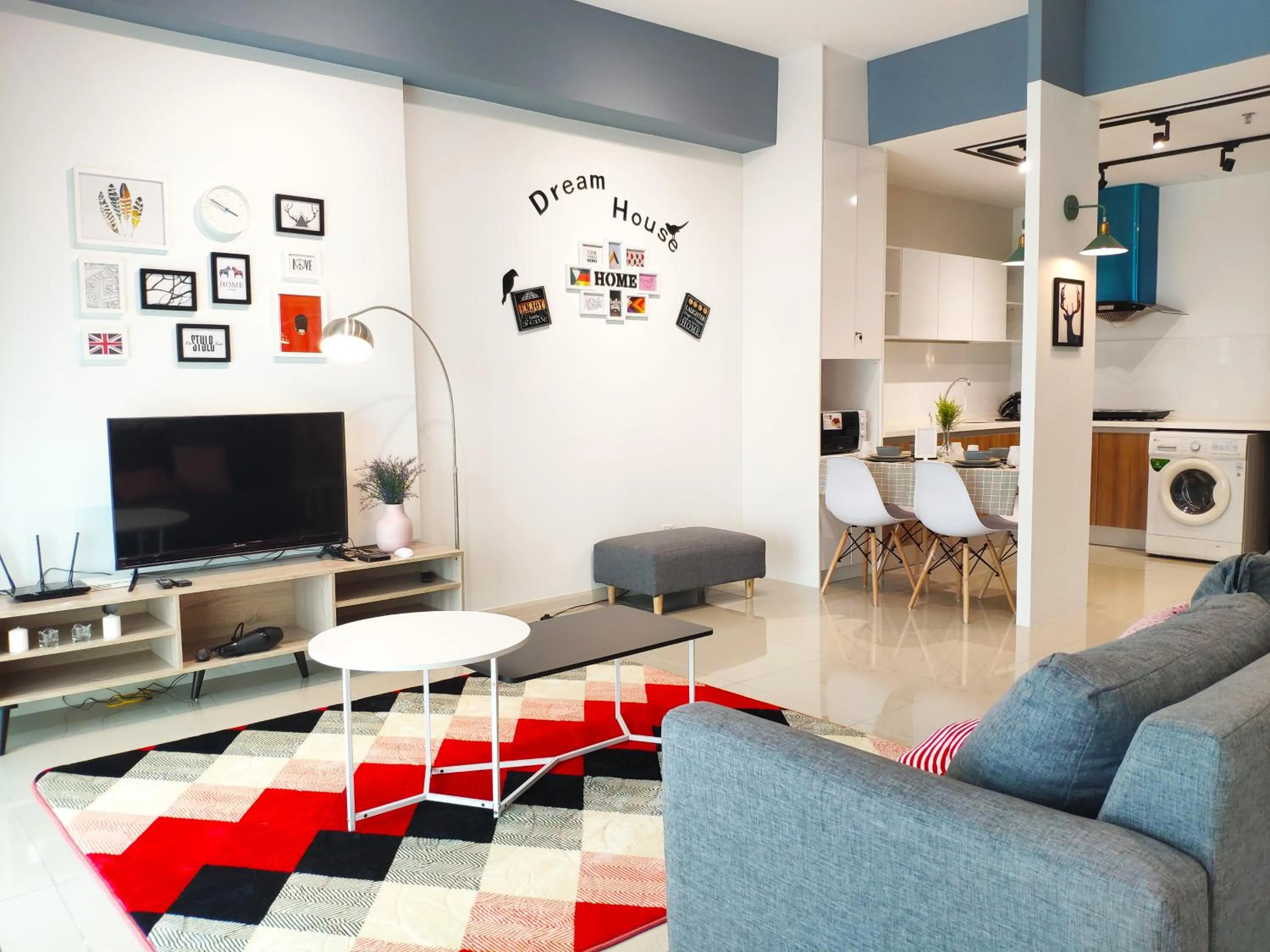 Living room in 5-Star Apartment + Infinity Pool, 4 pax, 1 min to Jaya One