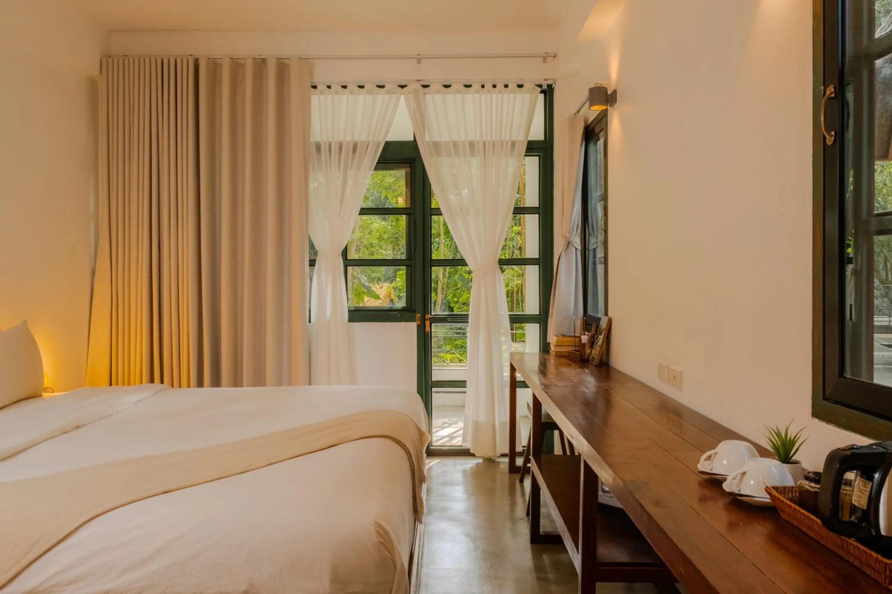 View (from property/room), Bed in Big Tree Boutique Hotel