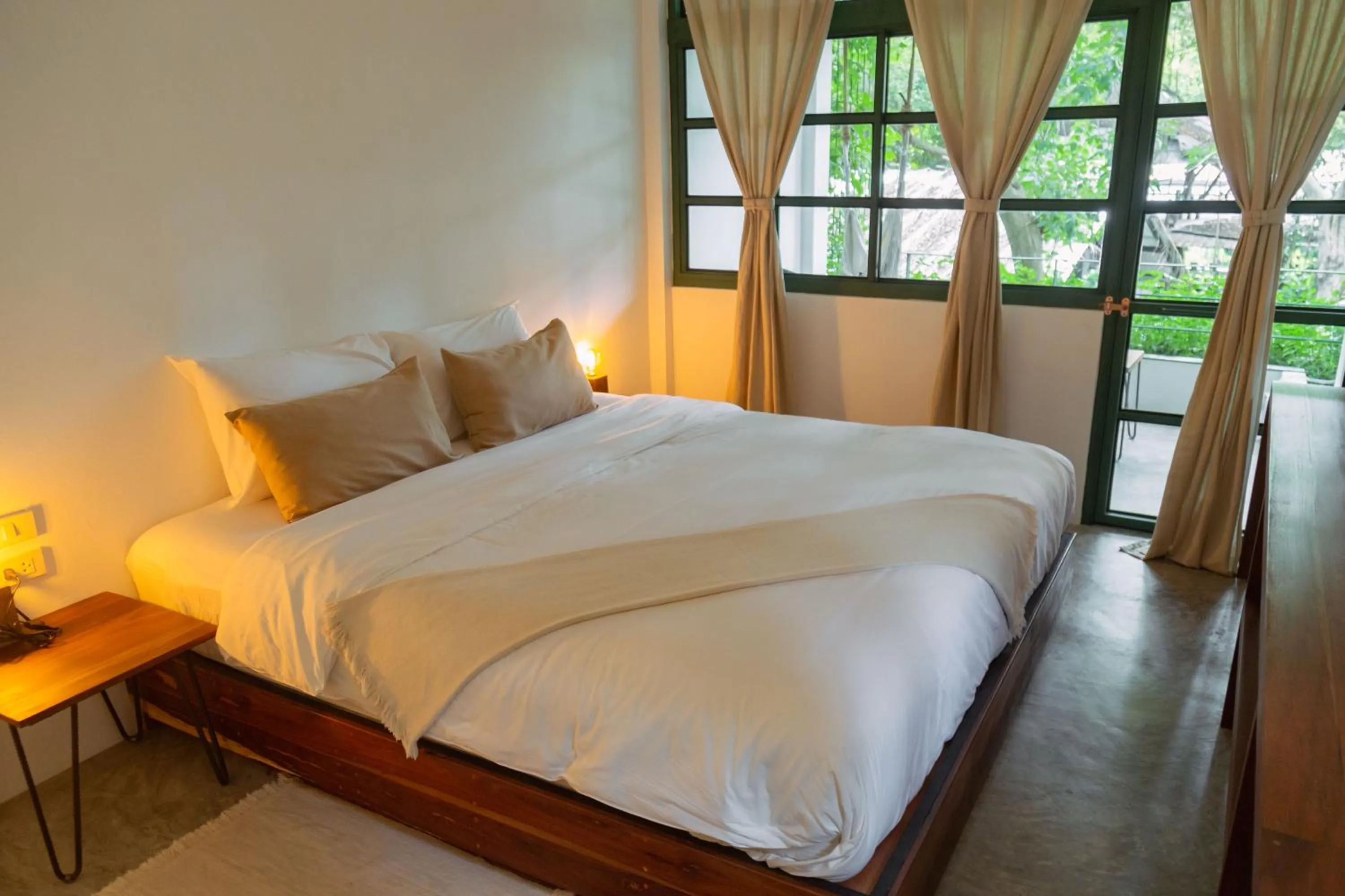 Bed in Big Tree Boutique Hotel