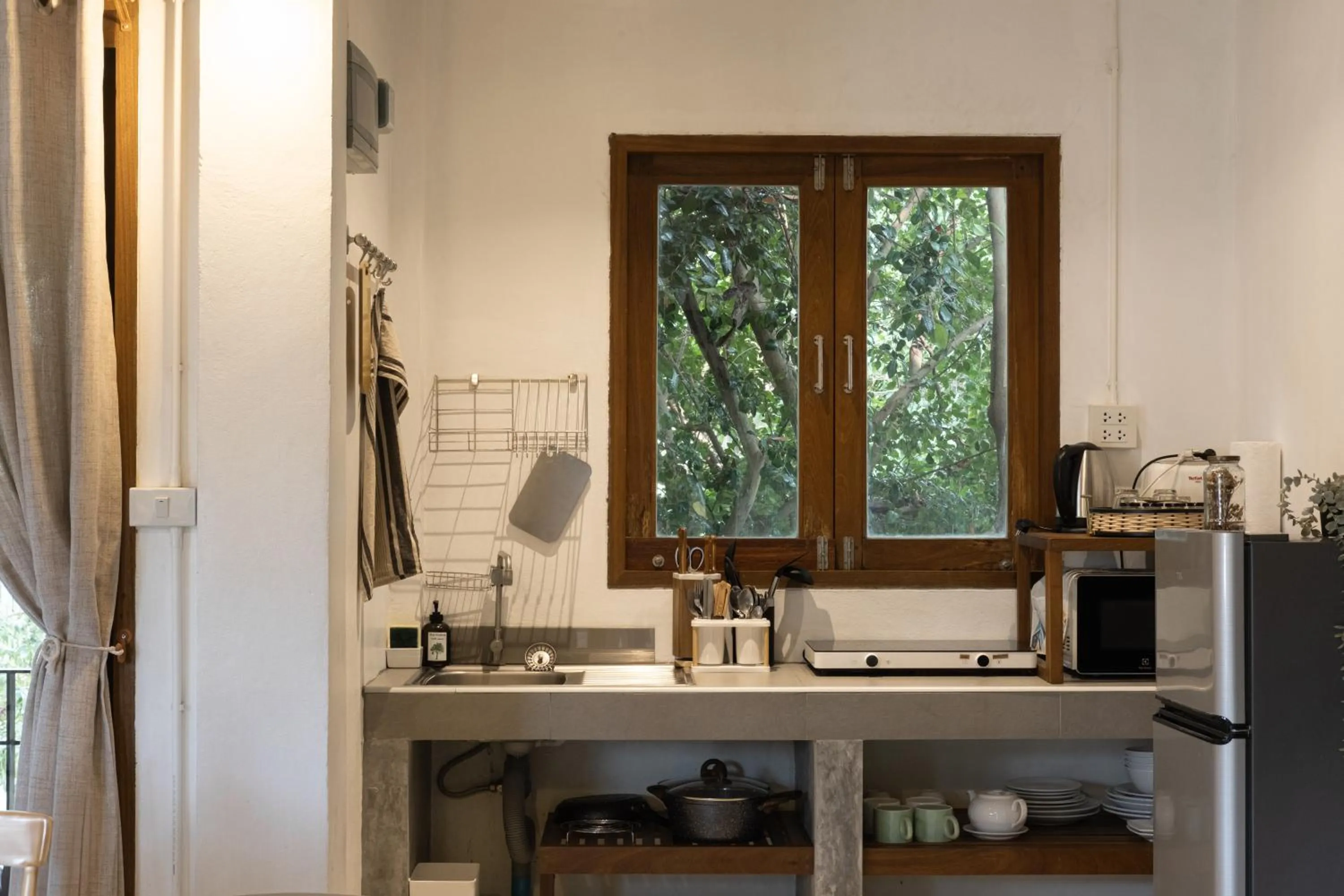 Kitchen or kitchenette in Big Tree Boutique Hotel