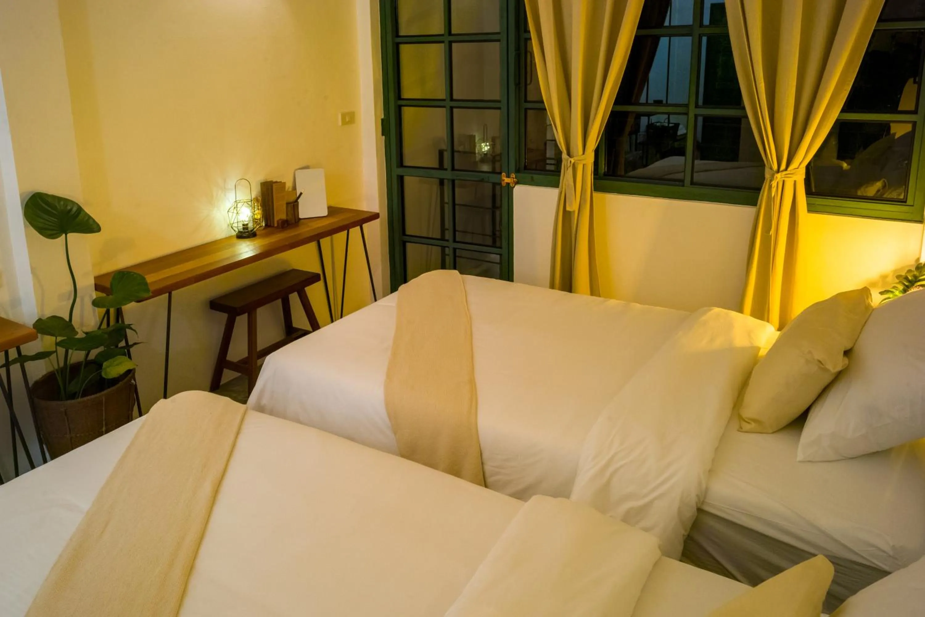 Bed in Big Tree Boutique Hotel