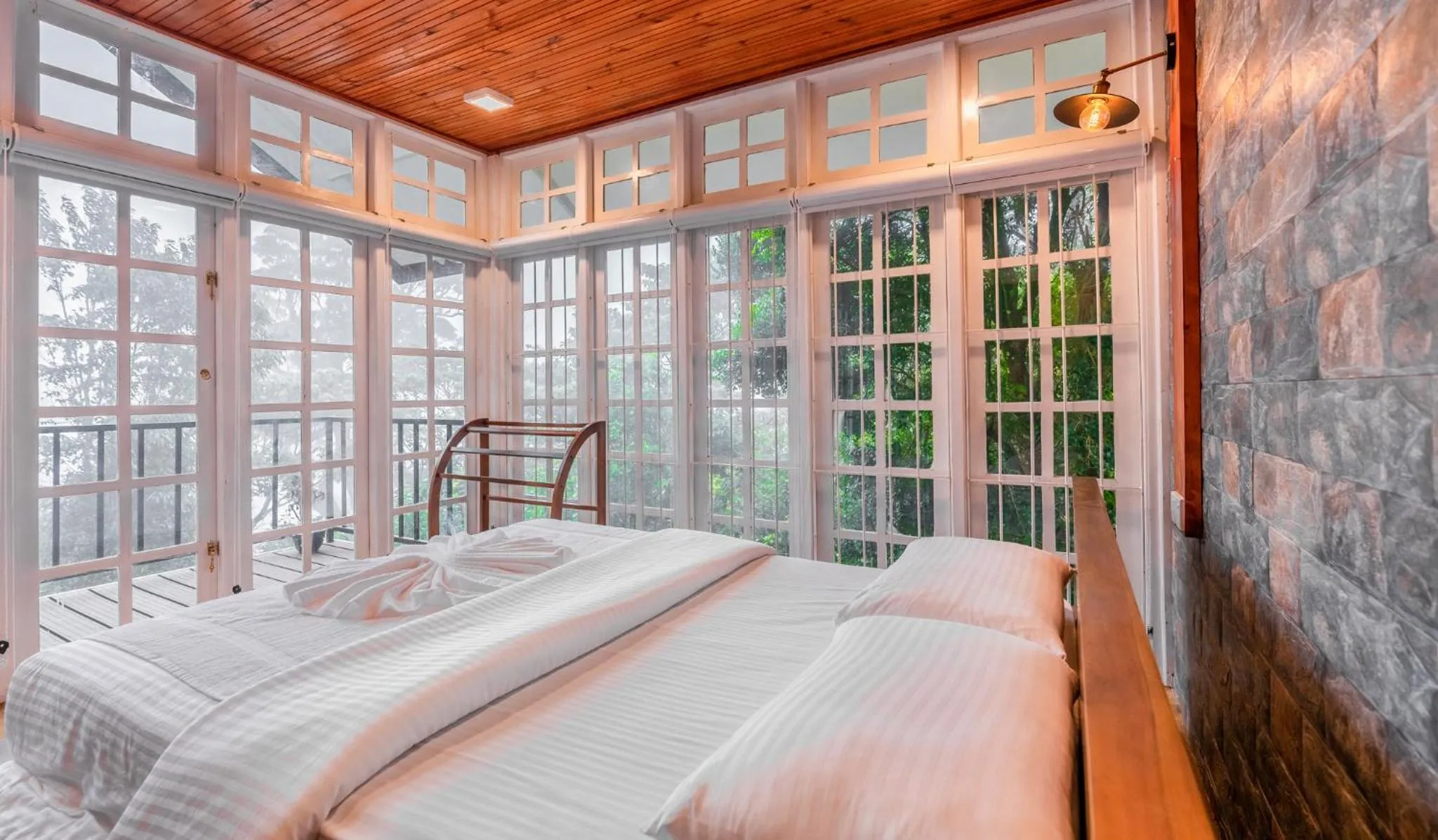 Bed in Mandaram Eco Resort