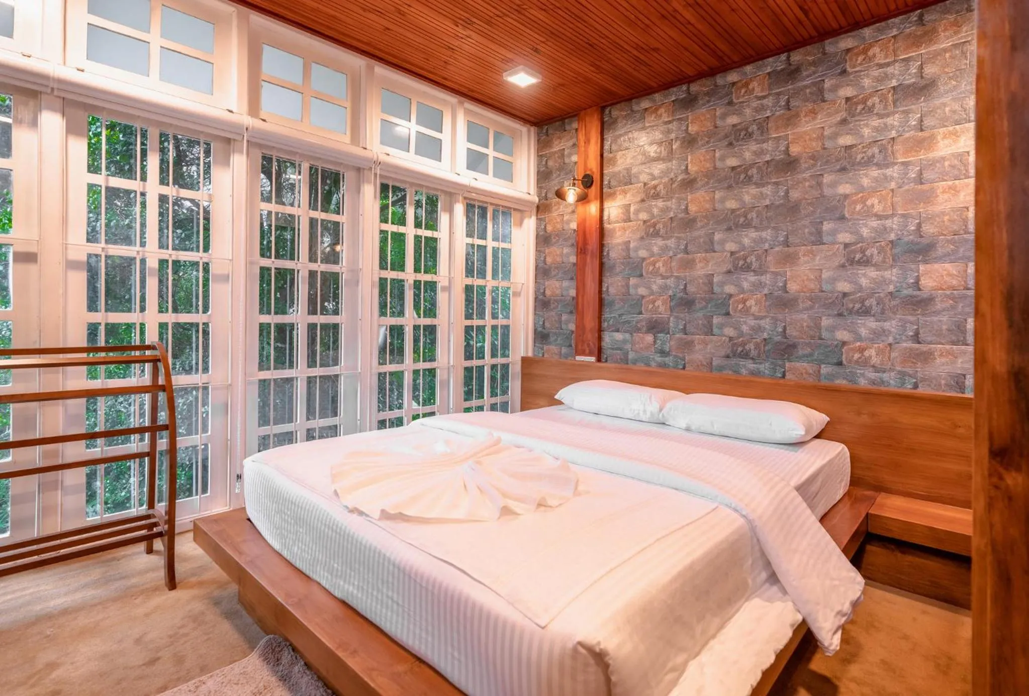 Bed in Mandaram Eco Resort