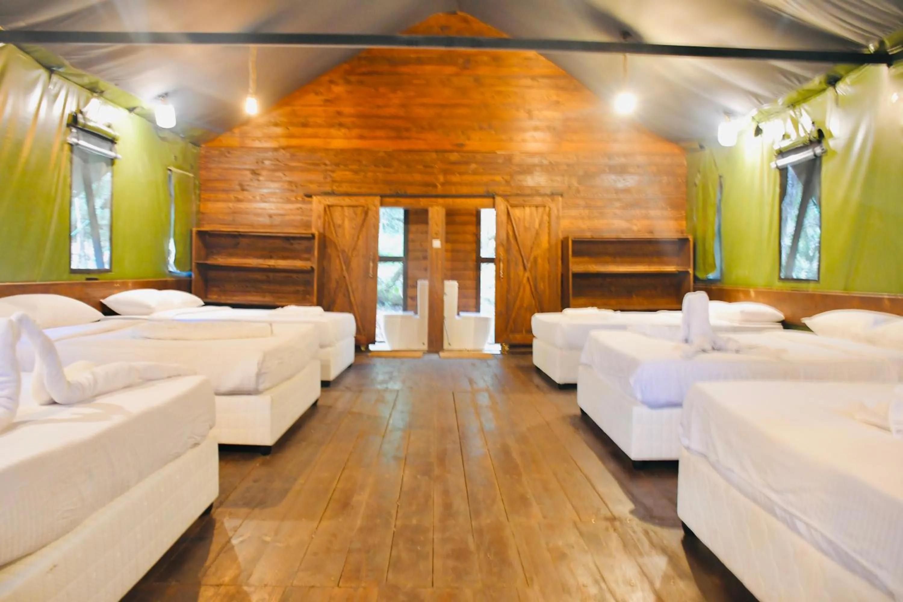 Bed in Mandaram Eco Resort