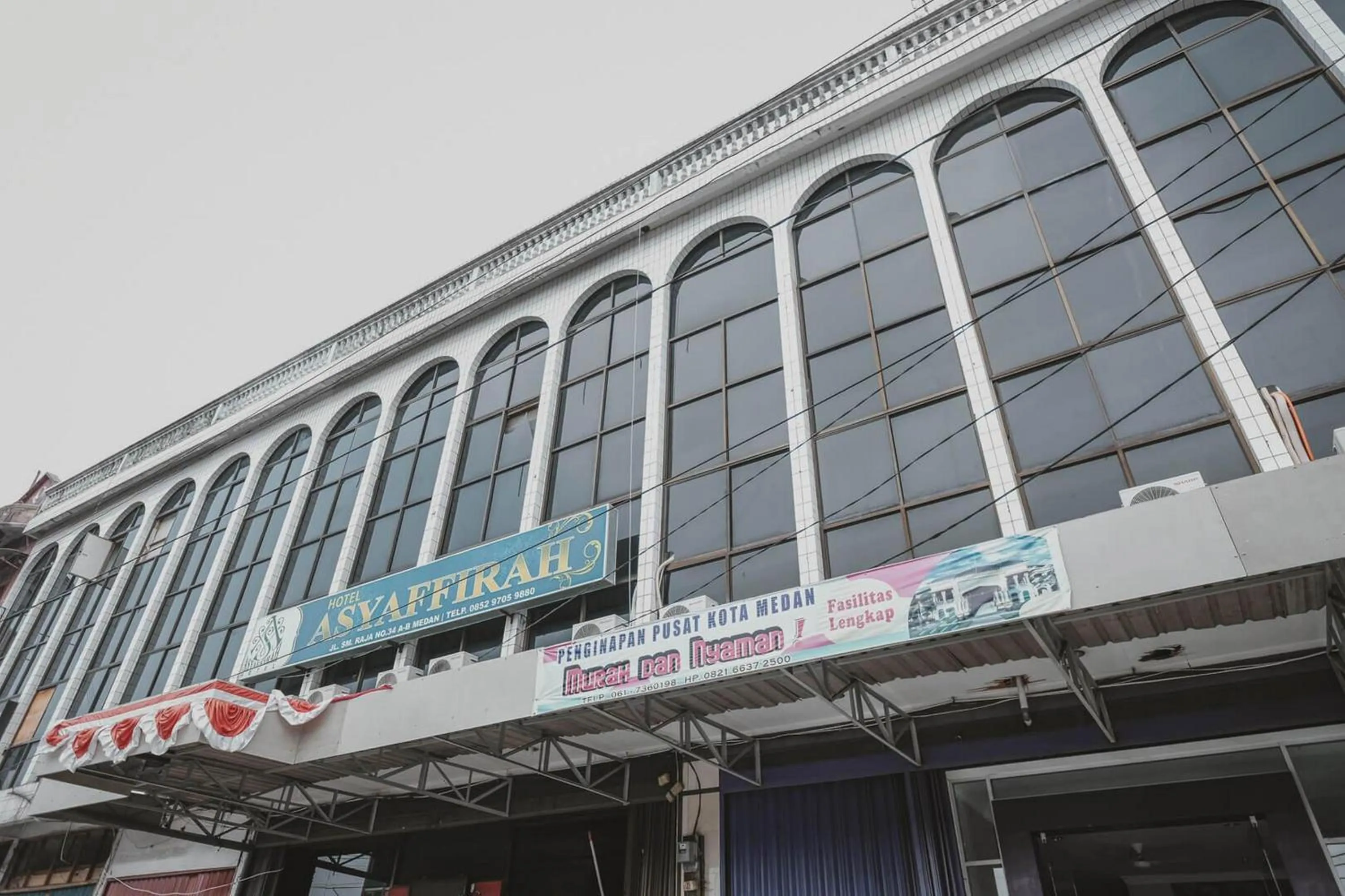 Facade/entrance in RedDoorz Plus near Istana Maimun Medan