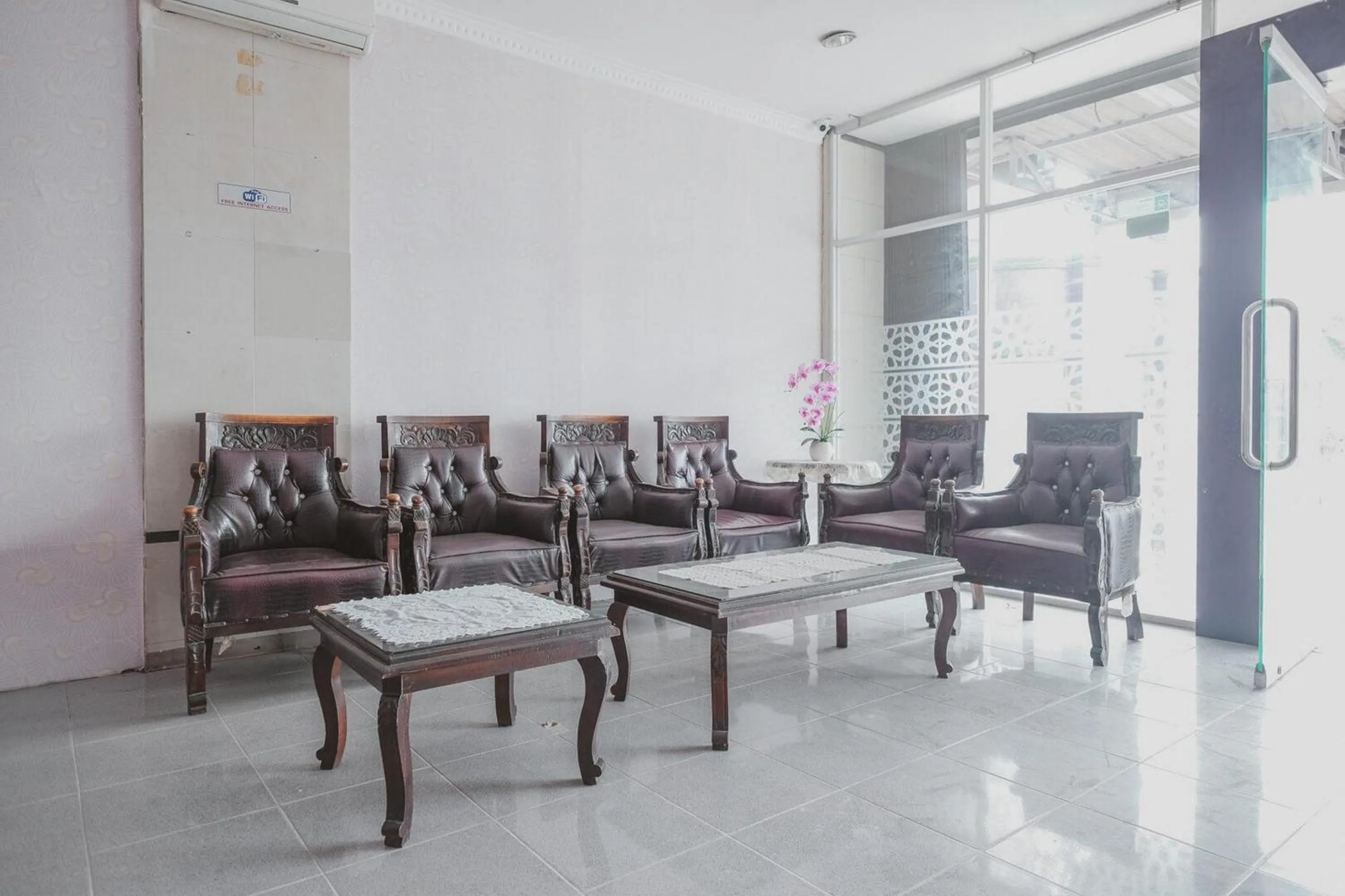 Seating area in RedDoorz Plus near Istana Maimun Medan