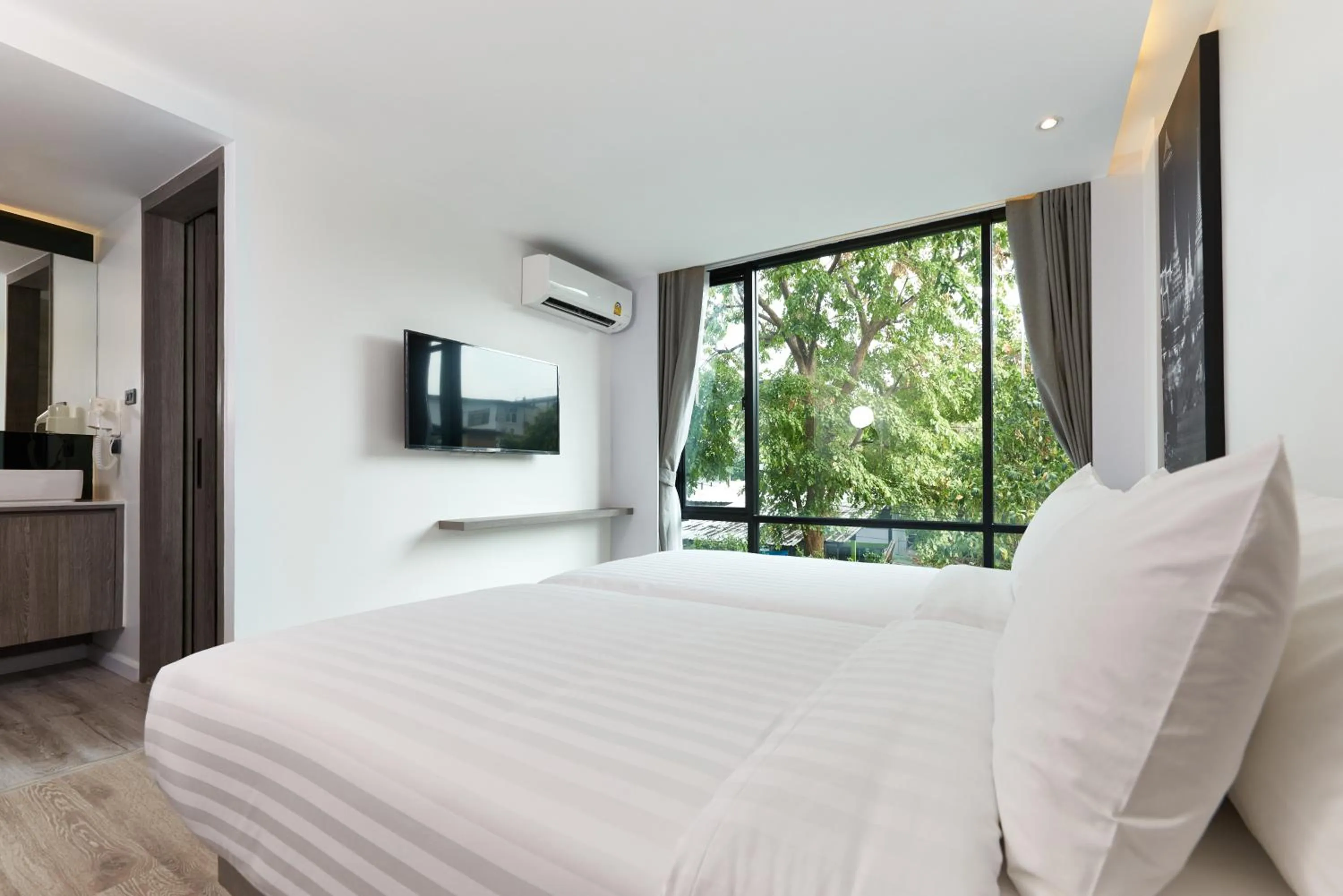 Bed in Amarin Hotel Rama 8