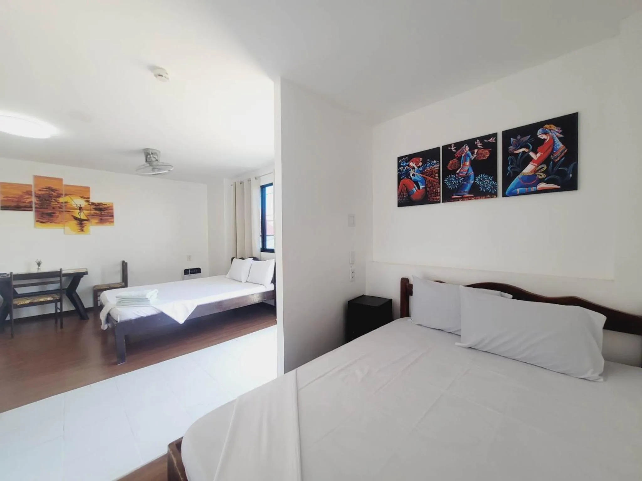 Bed in Gaja Go Dive & Inn