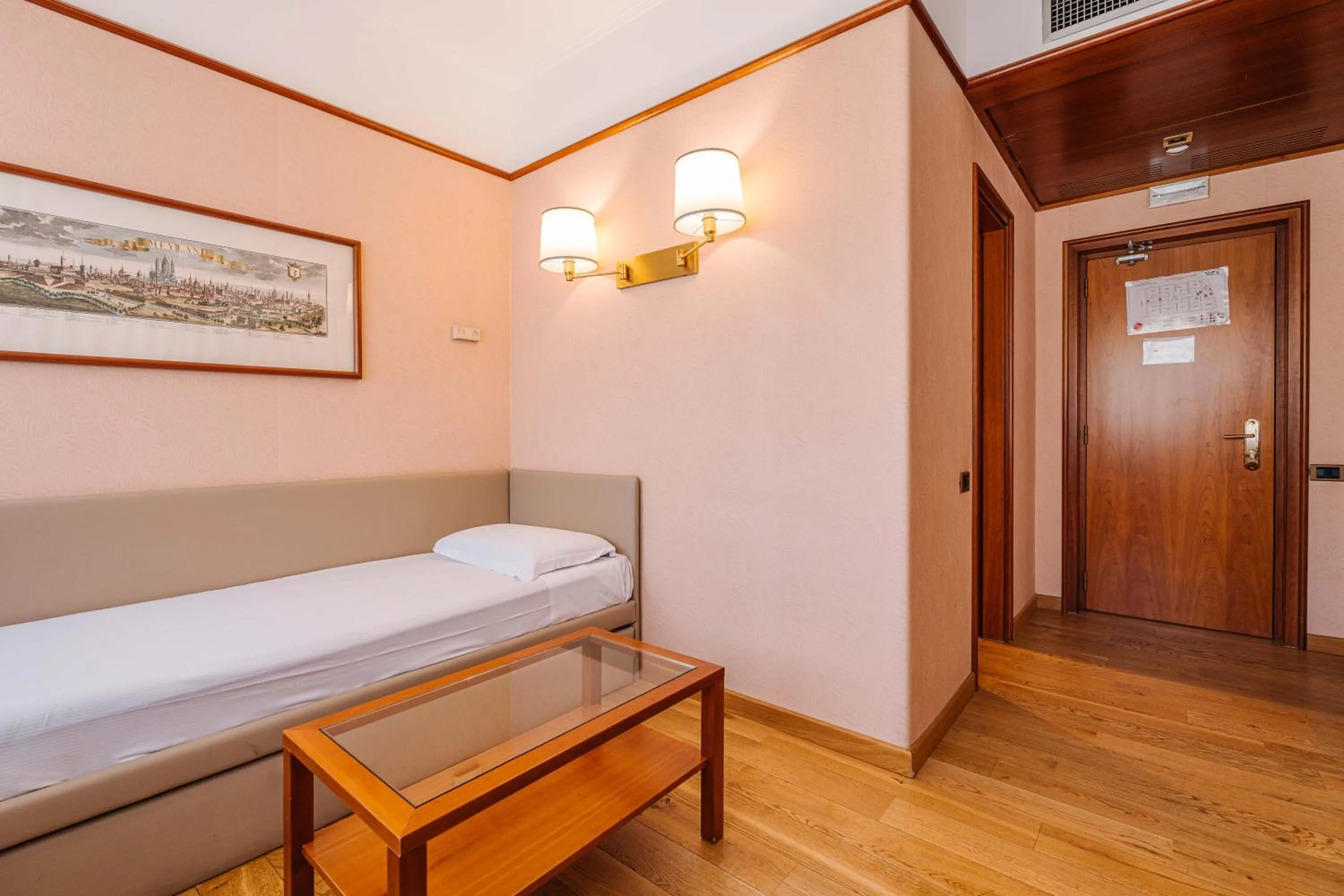 Bed in Crystal Hotel Varese