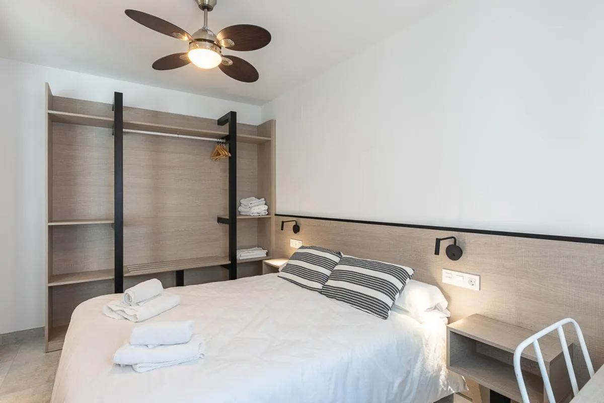 Bedroom, Bed in Apartamentos Guerrero 3