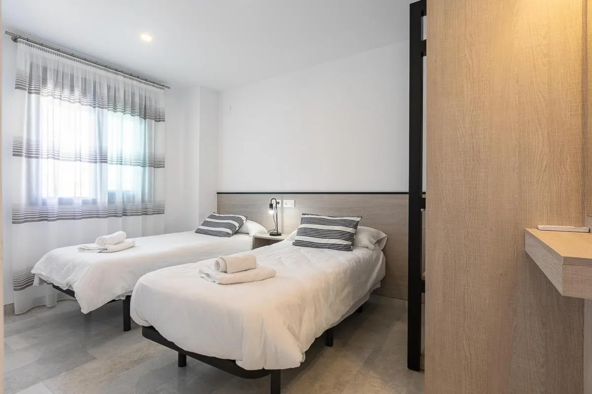 Bedroom, Bed in Apartamentos Guerrero 3